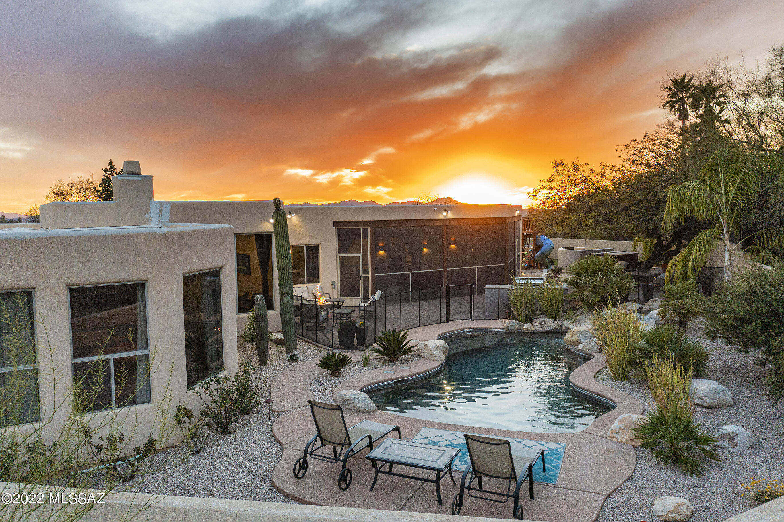 Breathtaking views of Finger Rock await you at this custom  home. Mountains views are captured from almost every room. Newly renovated kitchen, bathrooms, new built-ins in FR and LR. Open floor plan with high ceilings, formal dining room, living room with a fireplace, gourmet kitchen with  island, granite countertops, new S/S appliance, walk -in pantry, eating-in kitchen with views, travertine floors. MB with sitting area and fireplace, with adjacent bonus room. Large MB with jacuzzi tub, separate sinks, custom his/hers closets. Spacious guest suite with its own  entrance and full BA. A screened AZ room that takes you out into a  recently upgraded back yard with built in BBQ, kitchen, play area with turf, fire pit, gas heated pool, waterfall, above ground spa, and so much more!