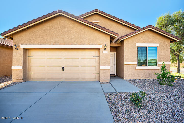 This beautiful new home comes with over $10,000 in upgrades including energy efficient kitchen appliances, spacious granite countertops, custom wood cabinets, brushed nickel hardware and an attached two car garage. The Bisbee floor plan also showcases a master suite complete with a walk-in closet, as well as a separate dining room, a fully fenced backyard, covered patio and front yard landscaping. The San Lucas community offers a plethora of amenities including a community park, with basketball courts, sand volleyball courts and a baseball field. The amenity-rich community and new, hassle-free home provide an extraordinary lifestyle for you and your family.