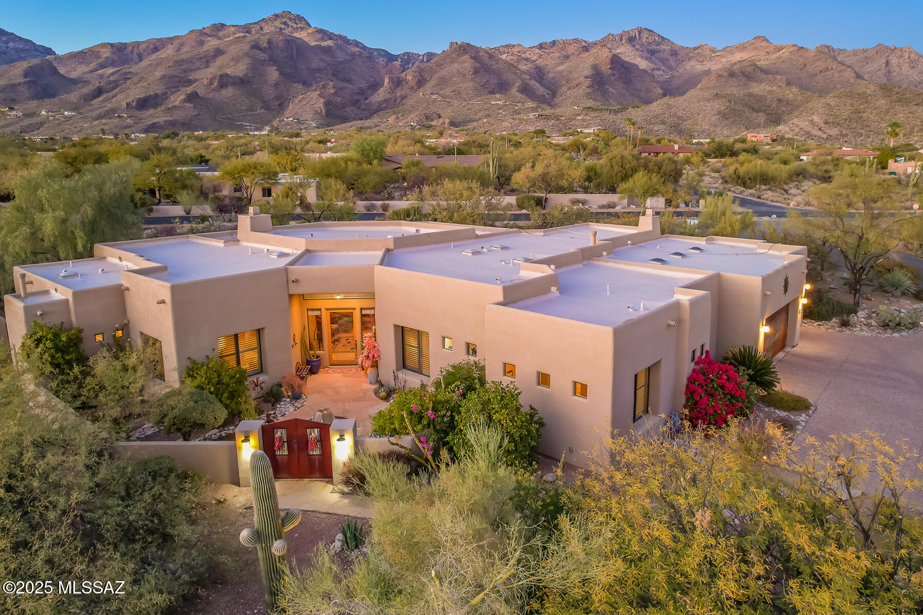 PRICE REDUCED! Exquisite newer 4BR  w/den southwest contemporary  home designed by Greg Simmons & built by Al LeCocq. Private 1.25 acre lot within walking distance to Sabino Canyon, schools & offers wonderful mountain views! Spacious great room w/soaring ceilings, large windows, built-in bar & fireplace. Separate family room.  Gourmet island kitchen w/ beautiful custom cabinetry, SS appliances, built-in refrigerator, granite counters & large walk-in pantry. Spacious primary suite. 4 luxurious bathrooms. Gorgeous tile & oak floors. 8' solid doors. Updated HVAC units. Roof w/ 3 year warranty. Extensive updating. Enjoy the great outdoors in the north facing rear yard w/ expansive covered patios, hot tub & views! See More Section, 3D Scan, Floor Plan & Custom Features. This home is SPECIAL! Please use Agave Title, Kelly Ladrido Escrow Officer. 520-918-1683. Kellyl@agavetitle.com. Title Commitment with legal description and links to CCR's are in attached documents. 

Subject property is very similar to the home directly west (MLS 22405041) that sold for $1,895,000.That home has a pool and sold for $468 a SF. Also a similar new home with no pool a few lots away (MLS 22430492) sold for $463 SF. Both are very similar homes to the subject property and were built by Al LeCocq and designed by Greg Simmons.

Al LeCocq was SAHBA's Custom Home Builder of the Year award winner 2 times. LeCocq Custom Homes are built with engineered post tension slabs, fully sheathed plywood exterior walls (under stucco), R-38 insulation in the ceilings, energy efficient windows and many other custom features.

There is no HOA. Sellers pay $104 a year to Canyon View Est HOA for the HOA to maintain Rudasill Rd. Also contribute periodically for maintenance of Sabino Shadow Lane.

Back on market through no fault of seller or this wonderful home. Roof being serviced w/3 yr warranty by Salvador Roofing. Misc. repairs in progress include minor electrical and plumbing repairs. Also some new windows, new water softener and new utility closet doors (west side of home) are being installed.