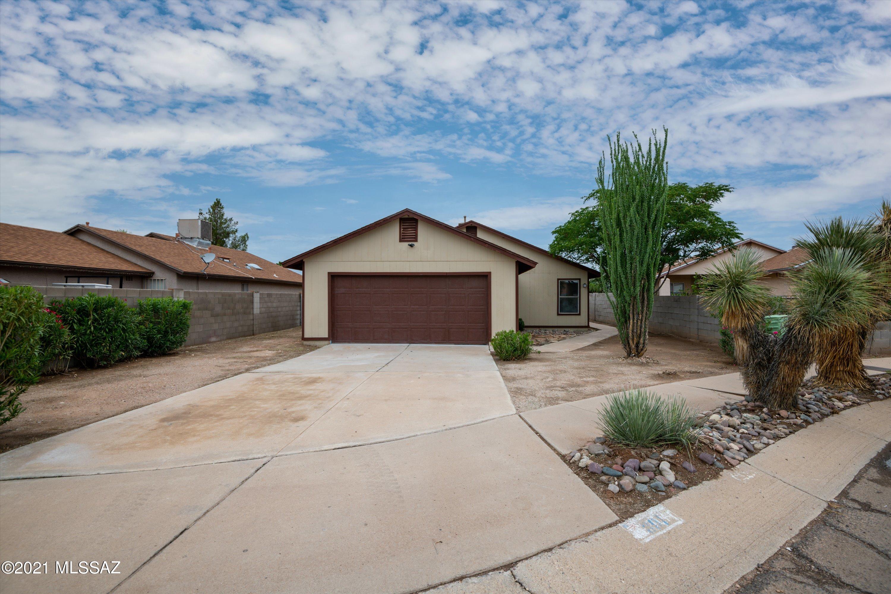 Beautiful 4 bedroom, 2 bath with 2 car garage.  Completely remodeled with new kitchen, bathrooms, large bedrooms, ample closets, 2 gorgeous new baths an interior laundry closet. Huge backyard with covered patio is a blank canvas for your dream desert oasis! NO HOA! Take a tour today!