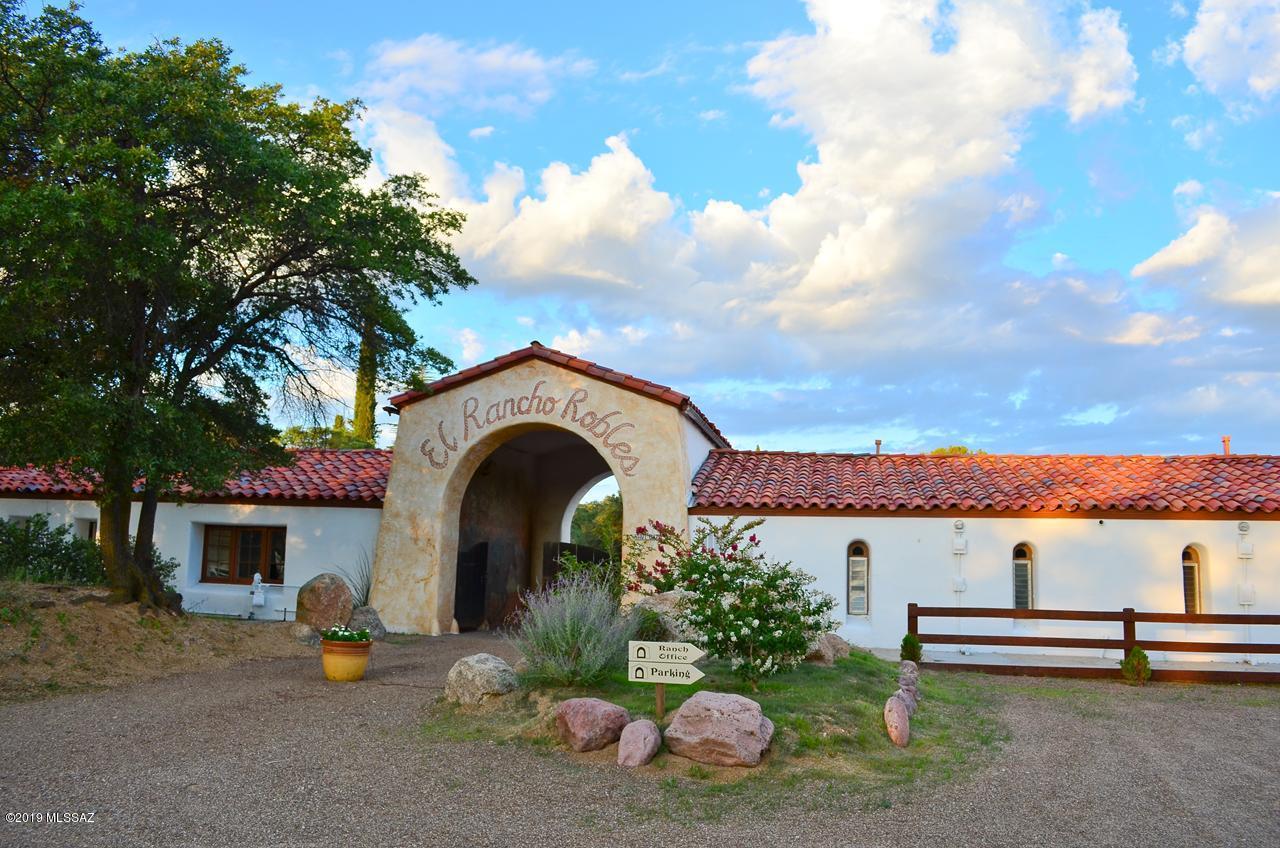 This beautiful property is being offered at as a fully fixtured and furnished guest ranch/event center on approximately 21 acres ,less than 30 minutes from Ina Road in north Tucson. It can accommodate up to 125 people in 23 separate units with
several large and smaller meeting areas, large kitchen, dining hall and much more! A great redevelopment property
too see the draft site plans for this amazing opportunity!