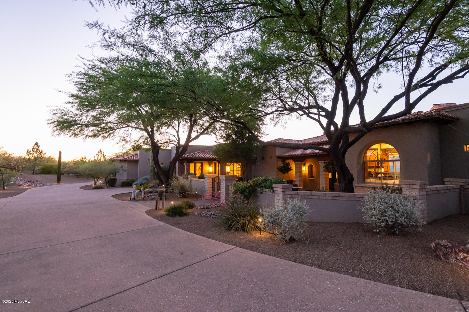 Breathtaking is the only word that describes this beautiful 4 bedroom/3 full bath home. Picturesque views of the Catalinas can be enjoyed from most every room in the home. Quality remodels to kitchen, appliances, bathrooms, & flooring just to mention a few. The new salt-water pool & spa surrounded by privacy bushes boast waterfall & fire features that will blow you away! The outdoor kitchen Mongolian grill & fireplace create a warm ambiance against the spectacular Tucson sunsets. The 2 bedroom/2 bath guest house (2007) has a 2-car garage, laundry room & granite counters. This luxury home is what Tucson living it all about! There is so much more to this home than can be listed, so pull the Notables sheet from the documents tab in MLS for more features. Call now for your private showing!