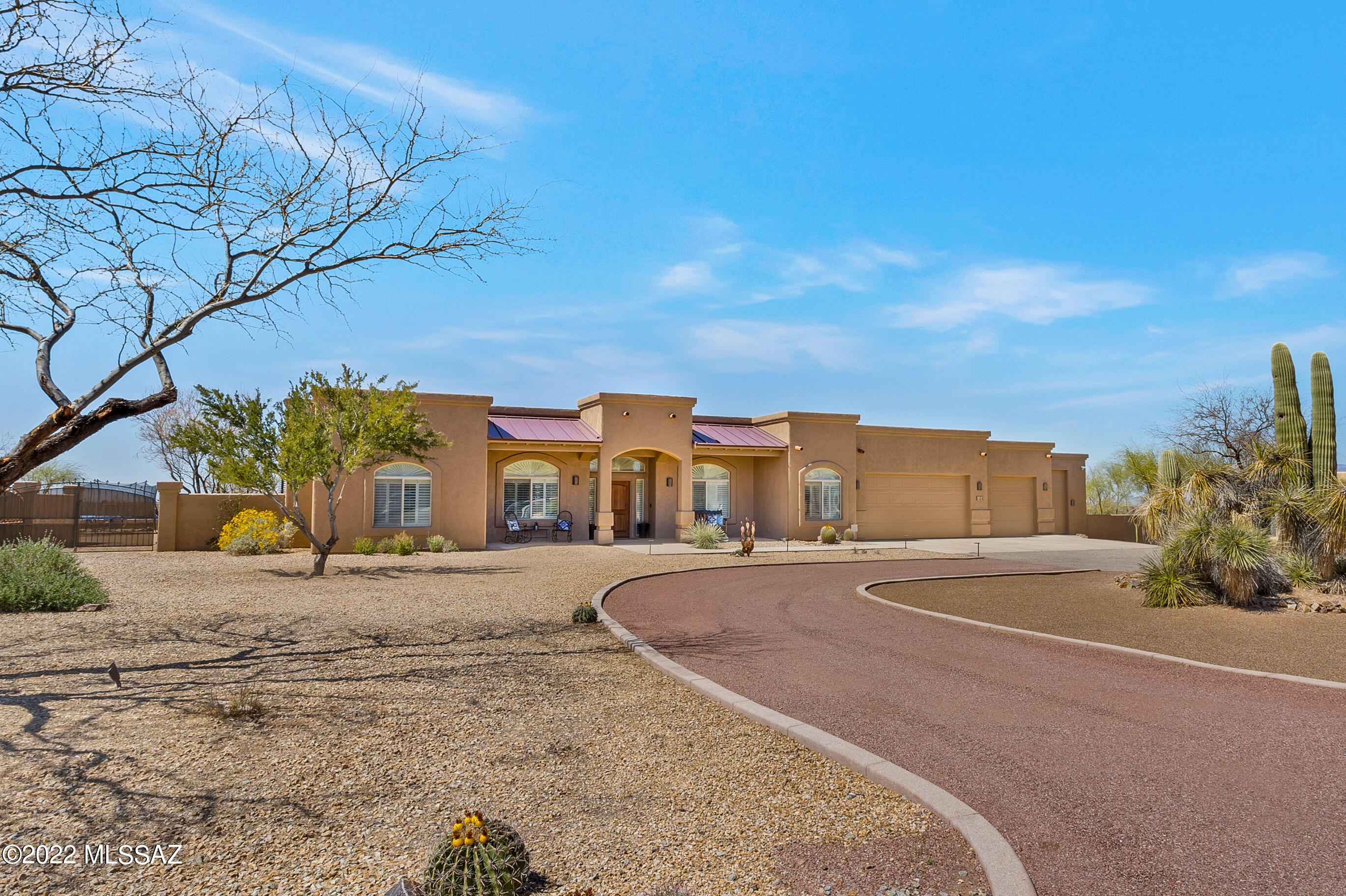 Custom Built home on 1 acre in a Small subdivision/ NO HOA.  2,846 sq ft with 4 bedrms/ split bdrms  / 2 1/2 baths with a 3 bay Garage and RV/Shop Garage.  Large Formal living room / Formal Dining Room that flows into the Great Room Kitchen Area that looks out to the huge covered Patio Area.  Backyard boasts a blocked stuccoed decorative fence with water harvest tanks to water plants.  Property also has a detached 880 sq ft  heated and cooled/ full bathroom oversized Garage /shop/RV Storage with 12 ft roll up door. Home was updated in 2020 with  a New Trane AC 18 Seer, on demand hot water tank  and new roof.  House freshly PAINTED  inside and out including RV garage  in 2021. All interior and exterior lights/fans replaced May 2021