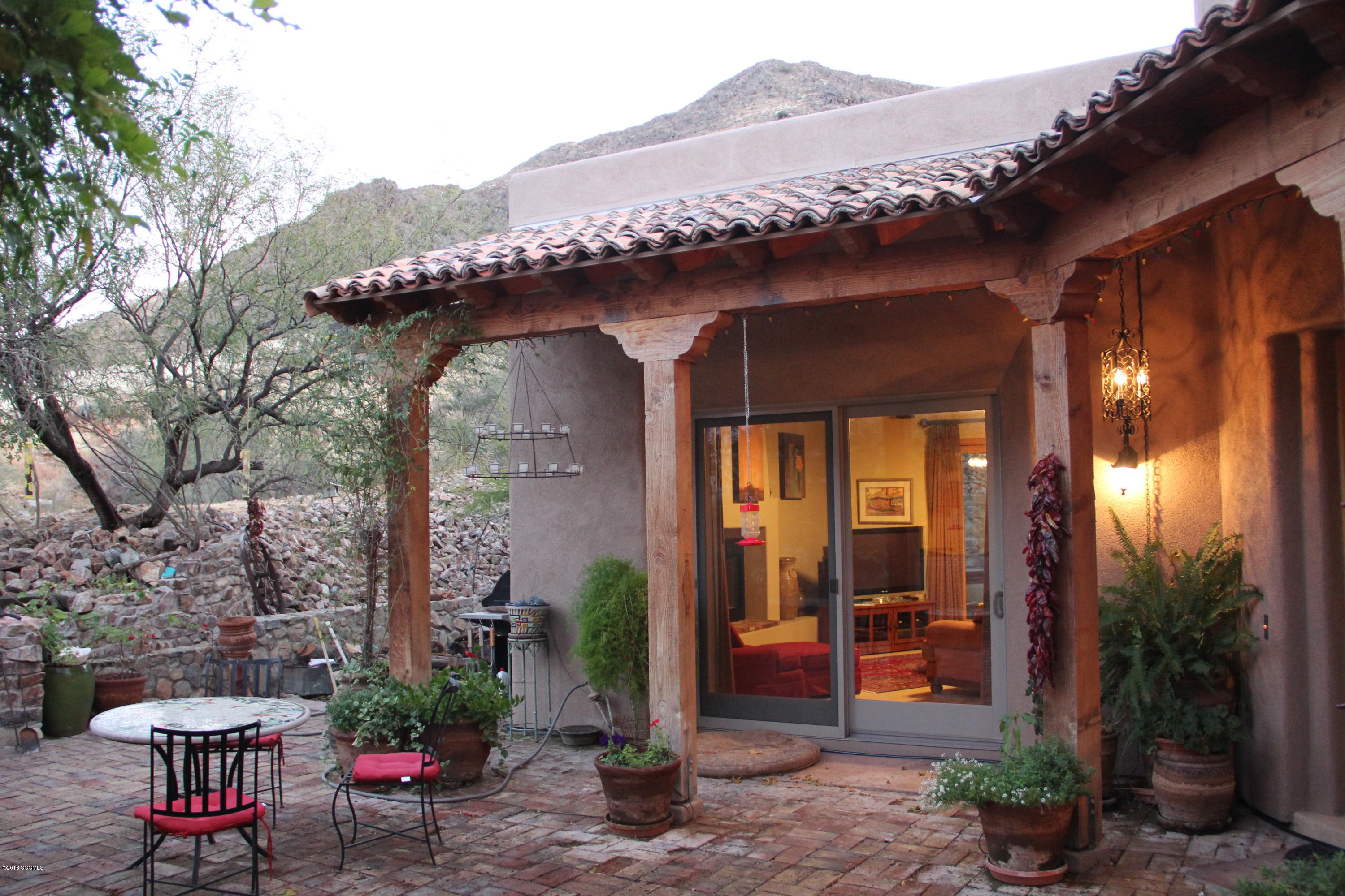 Majestic Views! Beautiful Dorn Hacienda Model on 4+ Gorgeous Acres overlooking the Santa Cruz Valley. Indoor, Outdoor living at its finest.Open floor plan, Spacious Kitchen with Granite throughout. Bonus Room opens onto Courtyard, currently used as office. Beautifully Decorated Separate Casita with Own Bath.