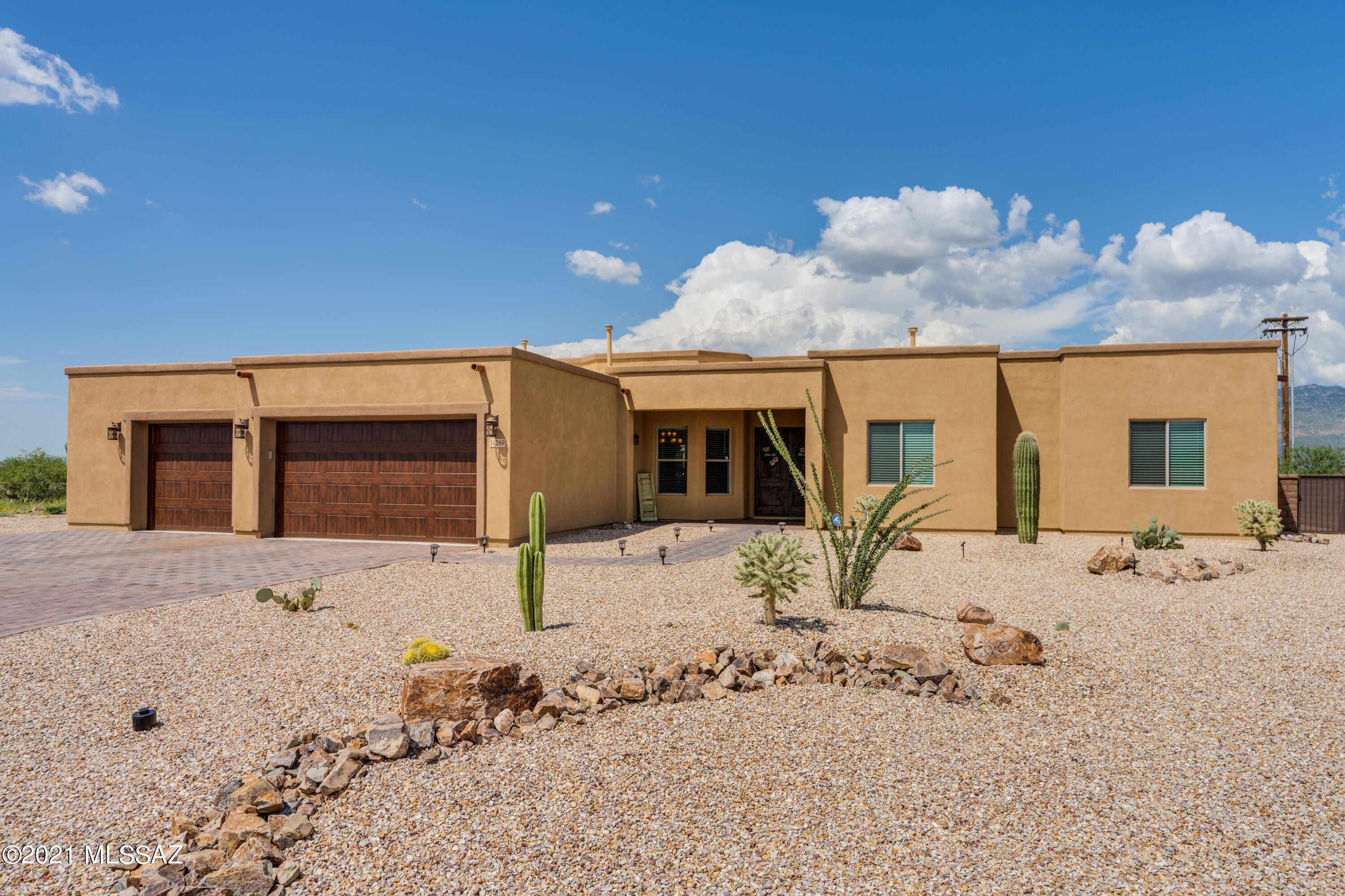 Beautifully upgraded 5 bedroom, 4 bath, 3 car garage 3720 Sq Ft home located at the end of the cul de sac on just over an acre. You will love the gourmet eat in kitchen with its crisp white cabinets, gorgeous granite, 6 burner stove, dual ovens, under counter microwave, kettle faucet, tile backsplash, pantry, farm house sink, wrap around breakfast bar with seating for everyone, pendant lighting and more! Bright family room with stacked stone fireplace, wood look tile floors and extended slider with amazing mountain views. Bright master with private access to patio, his and her walk in closets, huge shower with seating plus soaker tub, dual vanities with more gorgeous granite. Other extras include: game room/den, theater with elevated seating, formal dining room, laundry room with utility sink and lots of storage, guest bath with dual vanities and security system. Enjoy your spacious low care backyard with its stunning views from the large covered patio or from the pergola. Located in The Award Winning Vail School District.