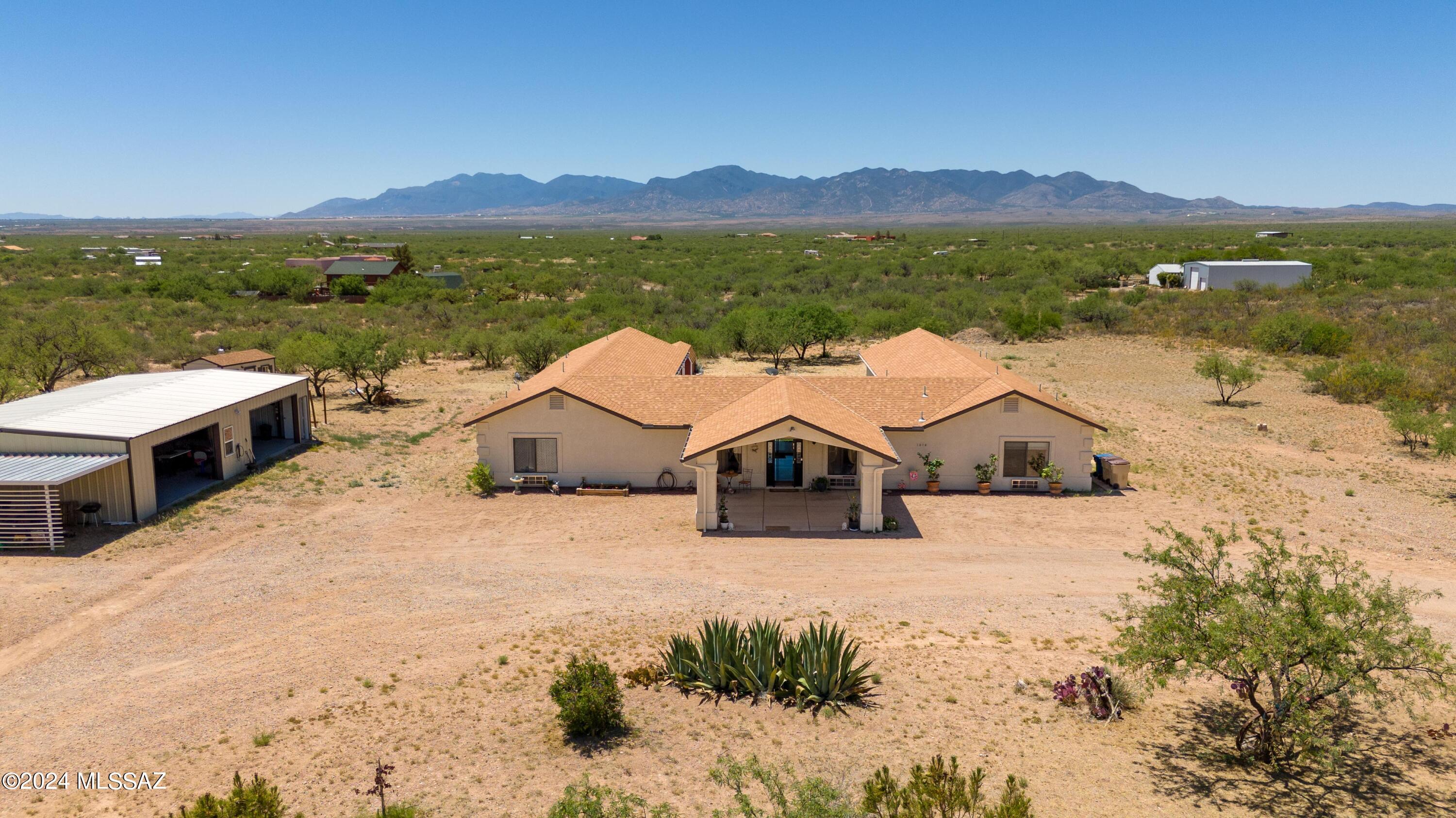 Custom Site Built Home with gorgeous mountain views all around. Complete with 9 acres. 4,300 sq/feet, 4 bedrooms, 5 bathrooms,Spacious Kitchen, Game/Media Room, Huge Workshop,Full RV hookups,she- shed and a separate yard shed for all your lawn tools.
Easy drive to Tucson, Close to the Sonoita Wineries, Tombstone, Bisbee, and Sierra Vista, this could be the place for you!