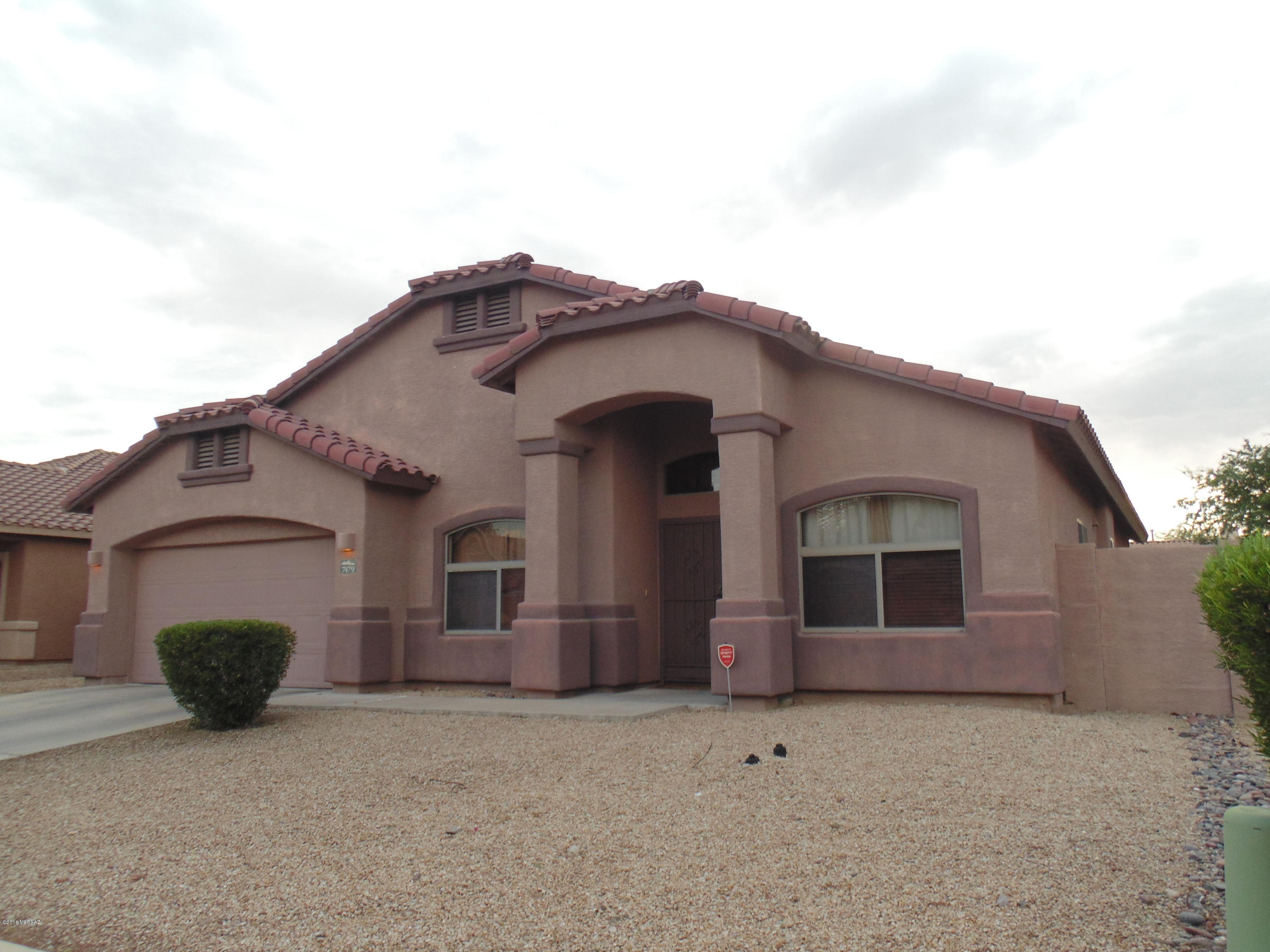 This 3 bedroom w/ den is ready to move-in.  Open floor plan great for entertaining.  Home features large walk in pantry, spacious walk in closet in master bedroom, and den/office can be easily converted into 4th bedroom. Enjoy the sunset views from large yard with BBQ/spa pad.  Ideally located near shopping and within walking distance to Crossroads Park and the Leman Academy of Excellence.  Stop by today!