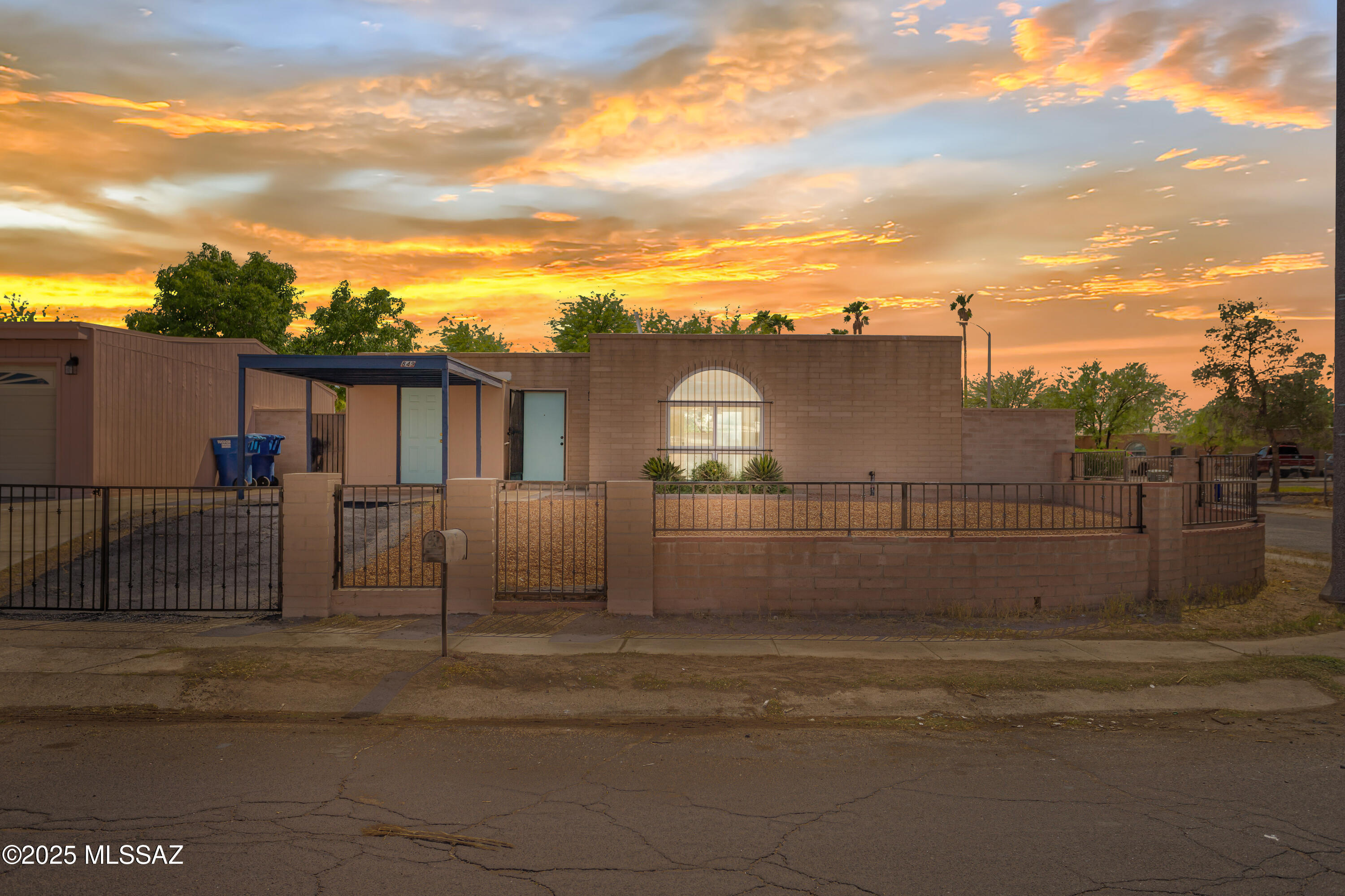 Beautiful and centrally located home in the heart of Tucson! This stunning Santa-Fe style fully remodeled residence is ready to become your own. With exterior upgrades like a newly built block and wrought iron fence, carport w/ storage, and fresh asphalt driveway on a large corner lot w/ NO HOA! This 3 bedroom and 2 bathroom beauty shows extremely well and is Turn key. With major upgrades like new AC/Heat Pump/Metal ducts, water heater, re-done roof, pex plumbing, and double pane windows. Enjoy the open concept beauty w/ the convenience of an indoor laundry. The large living room has tall ceilings, ceramic floors, and plenty of natural light from the arched windows. Enjoy the stunning kitchen that is a chef's delight with new white cabinetry, granite countertops, sparkling backsplash, and Stainless steel appliances. In every bedroom you'll find new paint, fresh carpet, ceiling fans, and walk-in closets. The bathrooms are like a relaxing oasis with all new fixtures, dual flush toilets, vanities, and luxury tile. The large backyard allows for entertaining guests, and it has plenty of privacy with a block walls and metal gates. Only minutes out from shopping, freeway, parks, and schools. Don't miss out on this desert gem, and make it yours TODAY!
Owner/Agent.