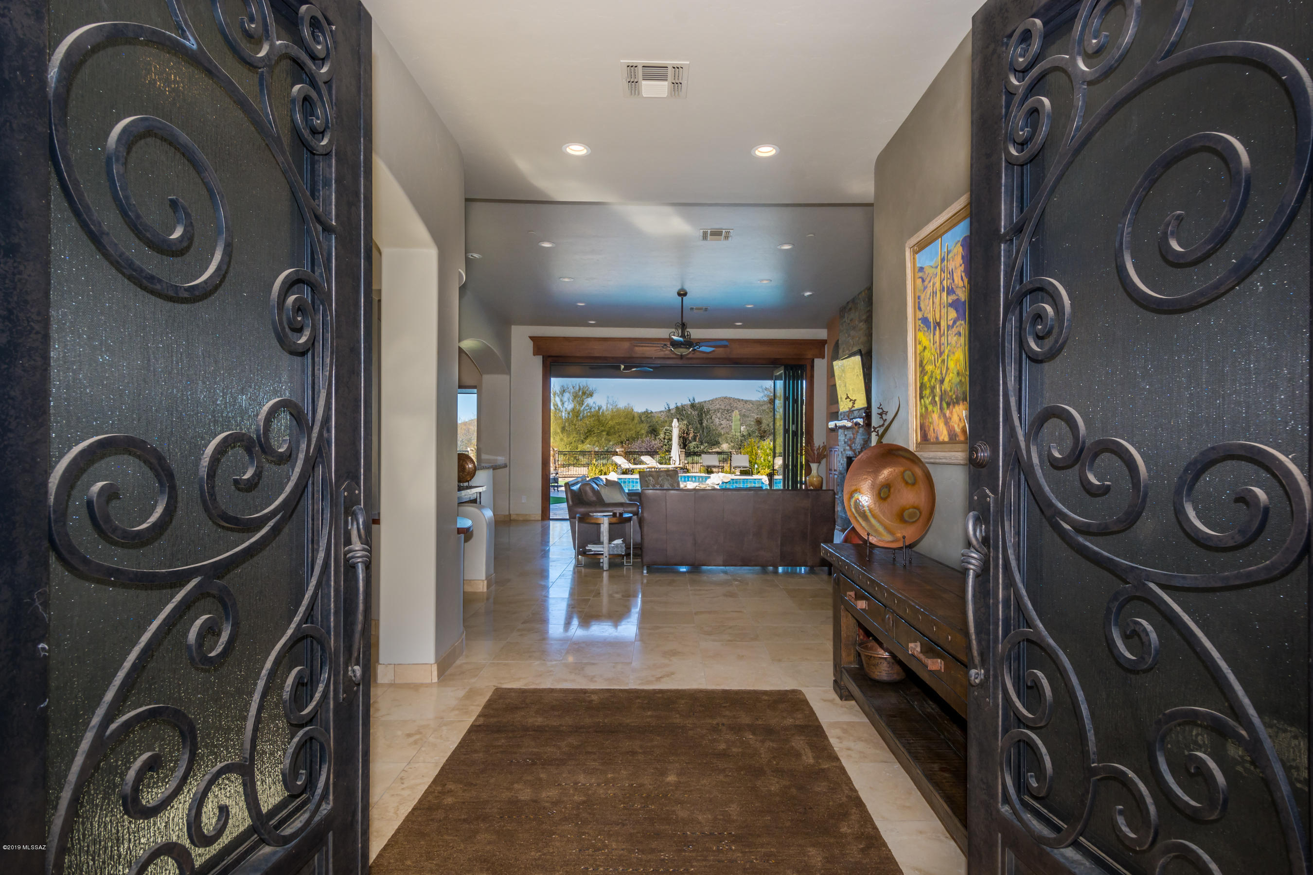 Stunningly remodeled & no details left unfinished !  Gated Dos Lagos, So. Course near 15th tee box w/Tortolita views. Travertine floors & Alder cab, & doors, shutters thru-out, plank tile in all BDRMS. Gourmet kit. SS, Wolf, Subzero, GE mono, wine frig. Custom Island w/rough edge granite. Stacked stone walls w/Mesquite inlaid mantels & accents thru-out. Venetian plaster walls adorn spectacular bi-fold glass doors bringing the outside in.  This split plan has master w/soaking tub & walk-in shower w/2 organized closets. 2BD each w/full BA/den & or office w/powder room. Travertine patio w/sparkling pool/spa & raised firepit to view amazing sunsets. Built-in kit, putting green & artificial turf. 3 Car gar w/AC. Call for private showing ! See documents attached for more impressive upgrades.