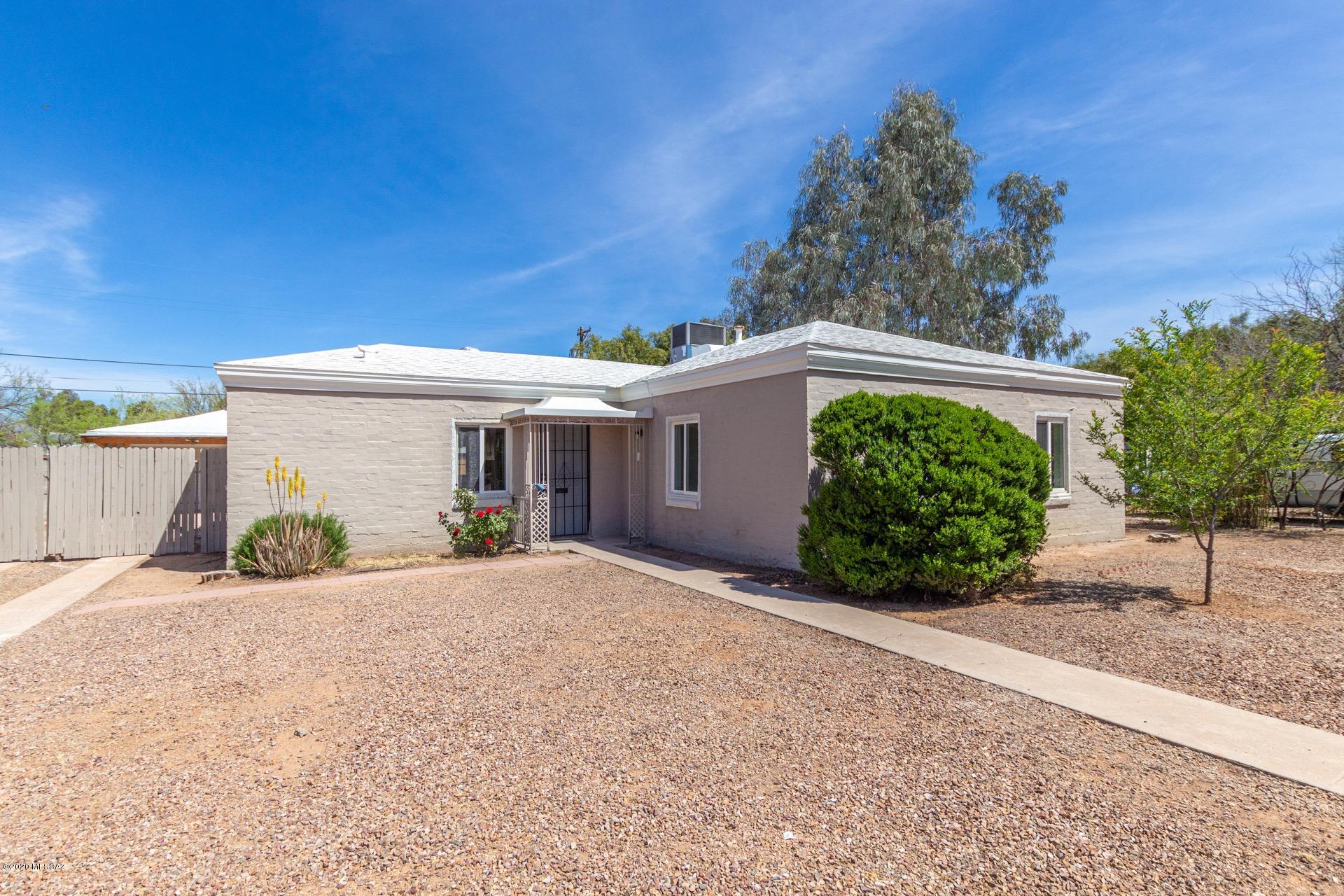 FULLY REMODELED HOME with a detached CASITA/IN-LAW SUITE and a GARAGE; which is conveniently located in the Beautiful HISTORIC Central Tucson and 7 minutes from the U of A and 8 mins away from TMC!! The kitchen has a new island, NEW COUNTERTOPS, NEW CABINETS, Stainless Steel Appliances and New Lighting features. The bkyard features a in-ground fire-pit, a pirate ship for the kids to play that is built around a tree, and a spa that is negotiable.  The entire house is freshly painted, NEW Central A/C and HEATING, NEW DOORS, Double PANE WINDOWS, FIXTURES AND HARDWARE.  The home has plenty of storage and ceiling fans through-out the house.  The Casita and enclosed back porch has added an additional 545 sq/ft of permitted living space.   Porch is permitted.  New roof with 5 year warranty.
