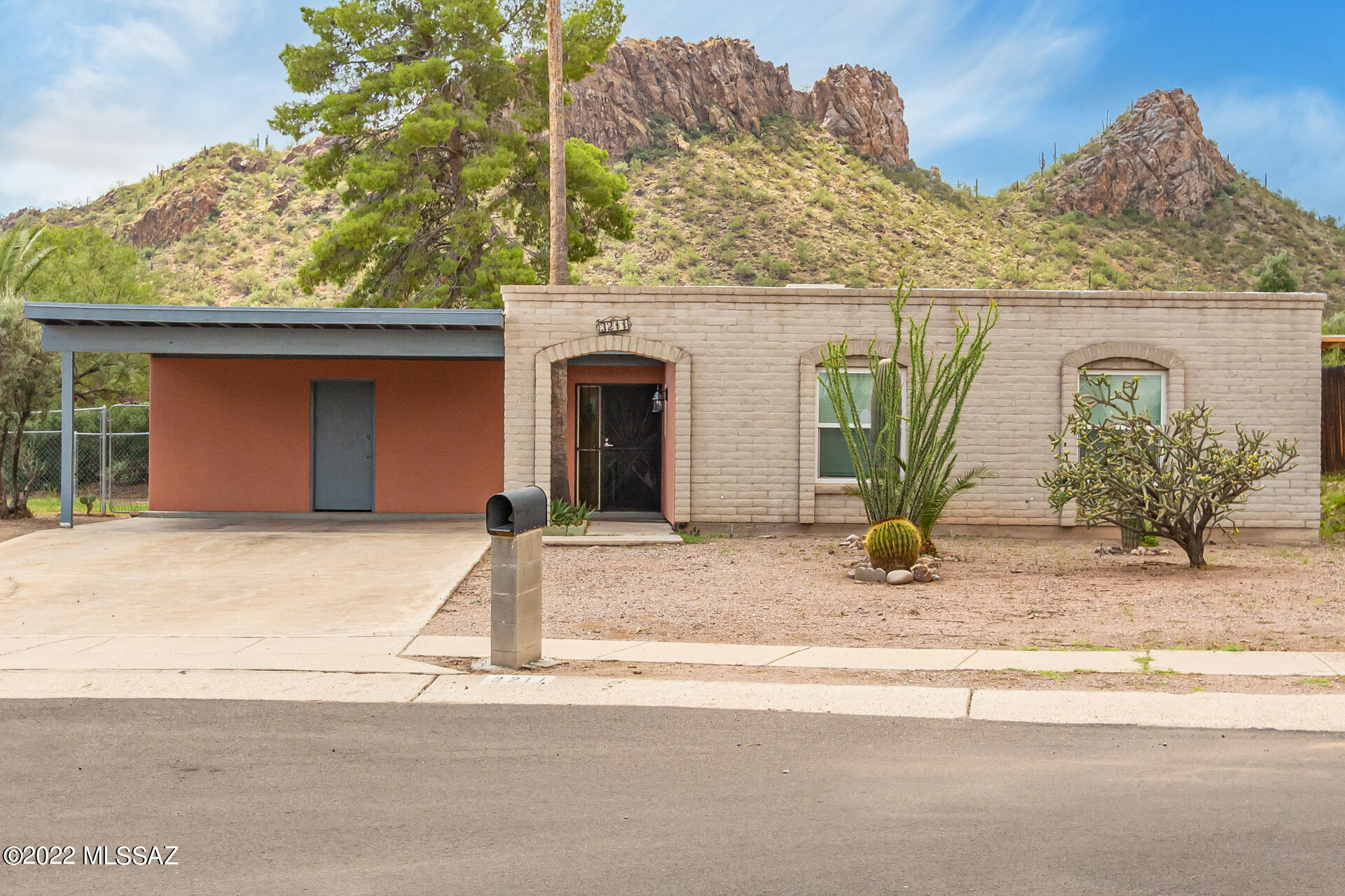 A TREASURE! 3 bed, 2 bath home in Manzanita Terrace with the MOUNTAINS BEHIND IT!!  Upon arrival, you will be greeted with Fantastic Curb Appeal, a 2-car carport, & custom front door. Inside & out freshly painted, you'll find new windows, tile flooring throughout, & a spacious living/dining room. The family room is perfect for entertaining- it showcases new French doors. Impeccable updated kitchen boasts clean cabinets, a pantry, tile countertops, and eat-in kitchen. AC/Heater only 6 years old. New hot water, new window treatments, & updated bathrooms with custom tile work!The master bedroom provides lots of space and a lovely bathroom suite. Relaxing covered patio, low-care landscape with spacious yard, & mature trees. 
Range Price.Seller will counter or accept offers from $269K to $279K This street is peaceful. Home is close to shopping and free-way.