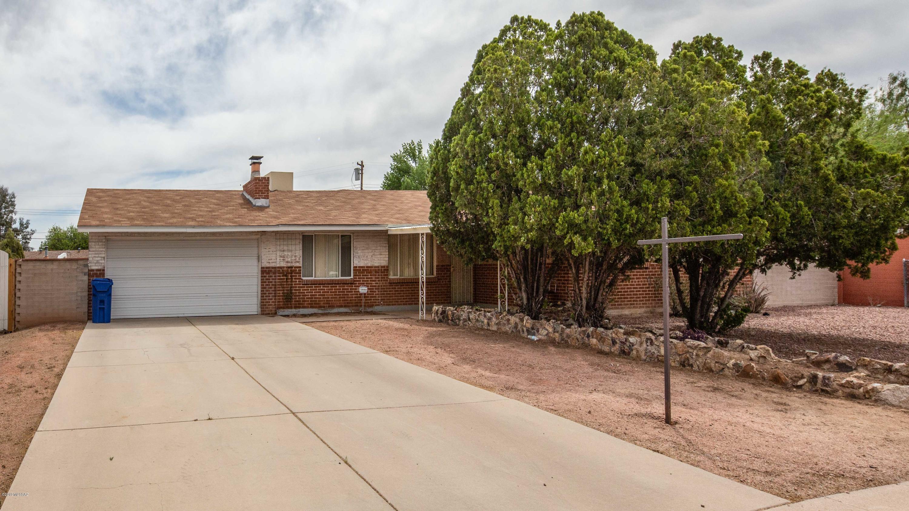 Wonderful 3 Bedroom / 2 Bath + 2 car attached garage Home in Highly Popular Tierra Del Sol neighborhood.  This home features two family rooms, kitchen with all appliances and island.  2nd Family Room (Bonus Room) has a fireplace.  Master bedroom has on-suite master bath.  Huge back yard with large covered patio, artificial grass and great mountain views.  Two large entrance gates – one in front and one in alley!  Great location that is close to shopping, services, transportation and DMAFB!  Please see 3D 360 Tour and Floor Plan under Photo's Tab.