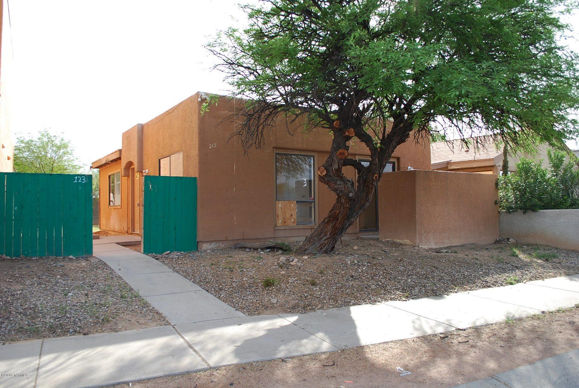 Much Potential! Affordable and located across the street from both the Elementary school and the community pool. Great room floor plan w/high ceiling! Floor plan wastes no space. Side and rear fenced yards - great for projects and pets. Shady mesquite trees! Offered as-is. Please note the numbers on gate are 123 but the address is 213 and is the 3rd house in from the corner.