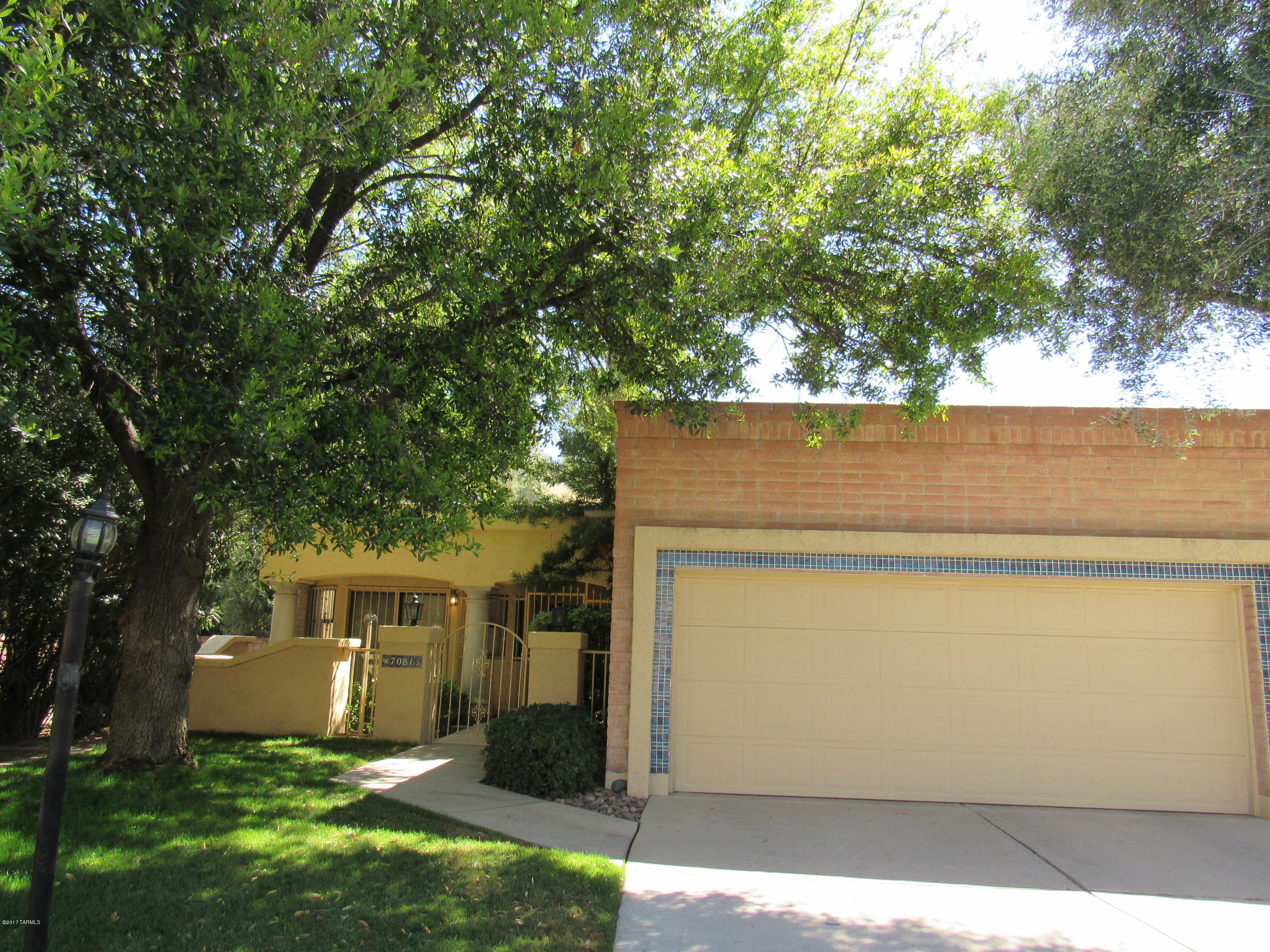 Huge price reduction!! Listed at wholesale pricing for this neighborhood!! Large 2 bedroom plus a den, in the desirable gated Riverbend Sabino community. End unit, with no rear neighbors and lots of privacy. Beautifully landscaped yard and iron enclosed covered patio. Lots of storage throughout the home and in the garage. The tennis courts, pool, basketball courts and exercise facilities are very close and convenient for you to use. Come put your finishing touches on this home and make it yours!