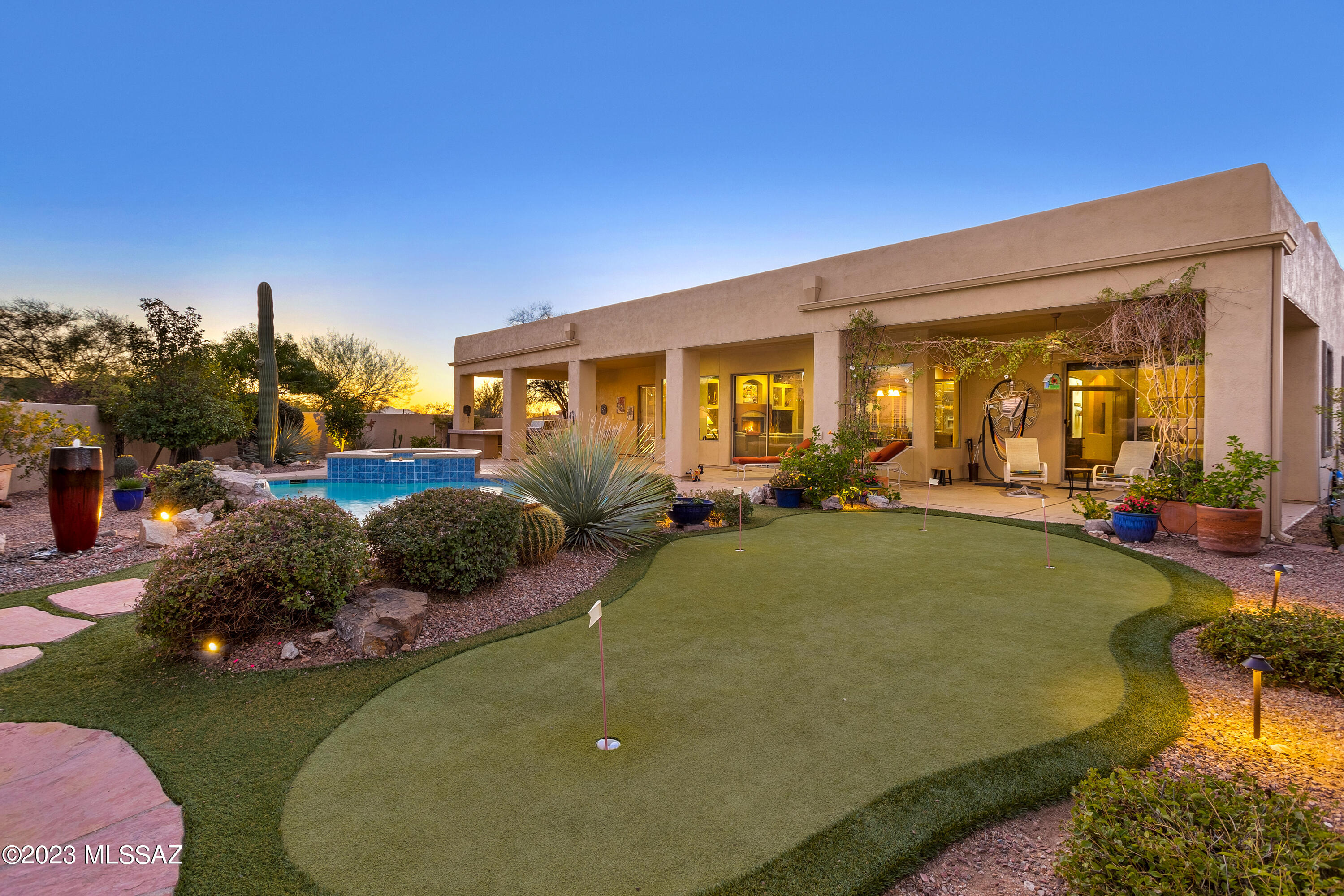 Stunning and meticulously cared for home located in the desirable gated community in Rancho Vistoso.As you enter into the welcoming private courtyard,you will be delighted with the open floor plan.4BR/3BA,office, formal dining area & separate sitting area.Gourmet kitchen features middle island, GE monogram SS appliances, alder cabinets w/ storage galore, chiseled granite counters and breakfast nook.Temp controlled wine room for the wine connoisseur.Spacious primary suite has large walk in closet,soaking tub and private access to the back yard.The resort style back yard offers pool, spa,putting green,water feature, kiva FP & bbq/outdoor kitchen,great for entertaining year round! Most recent updates are newer HVAC units, hot water heater,exterior home painted and much more! See features li Enjoy the wonderful amenities this wonderful community offers.This includes several  miles of walking and bike paths at the nature preserve and close to hiking trails,  restaurants, schools, parks, shopping and much more! This truly is living the dream!