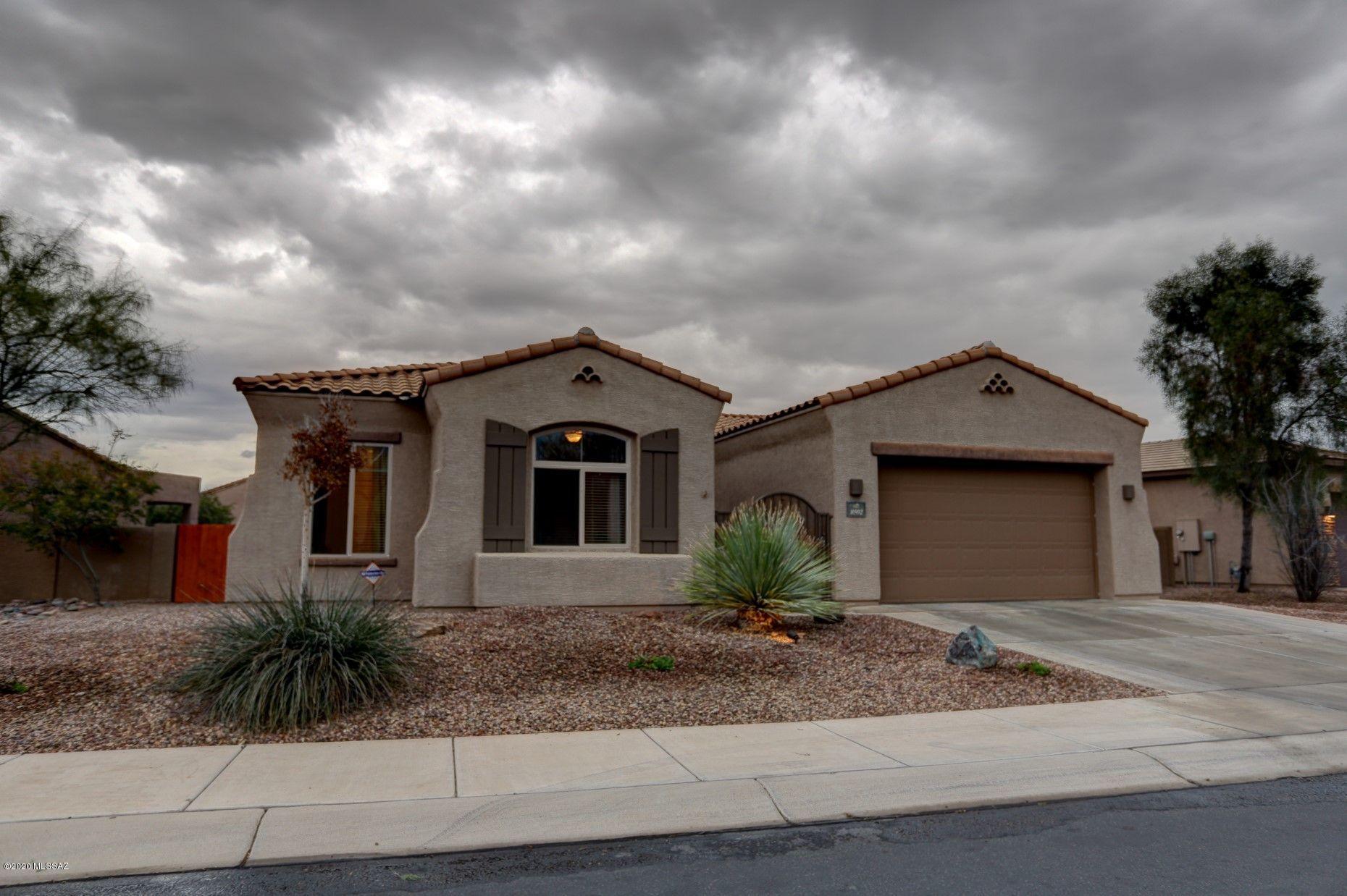 Gorgeously Remodeled 4bd/3bth home with finishes selected by professional designer located on a huge pie shaped lot that backs up to a cul-de-sac.  Entertainment lovers dream backyard featuring large covered patio, pebble-tec pool, BBQ gas stub, turf, etc!  Walk through the custom wrought iron front courtyard into a gracious entry way. Open floor plan with formal dining area and spacious great room anchored with honeybee, gas log, fireplace. Large eat in kitchen boasts Quartz counter tops on custom maple, shaker style, cabinets with inset stainless steel farm kitchen sink.  Master bathroom is exquisite with custom marble topped vanities, freestanding soaking tub.  New flooring throughout.  This home is impeccable and will sell quickly at this price. Hurry to see and buy!