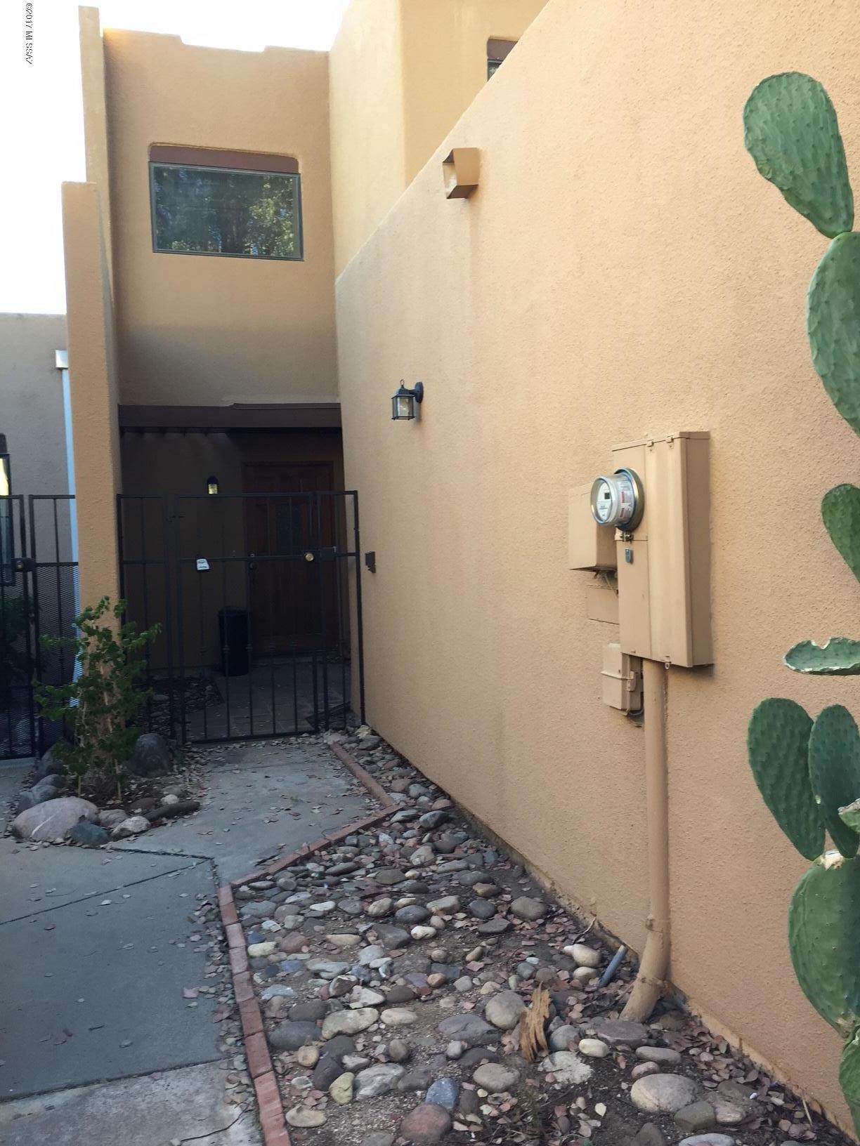 This home is a great opportunity in a quaint, 30 unit community, Central location, close to the UofA, shopping, medical, bus line. The first floor has a spacious, open living area with on site laundry, a bedroom and bathroom and a private back yard. Upstairs you will find 2 bedrooms and a bath. The community also features a pool and spa for the residents. Take a look today.