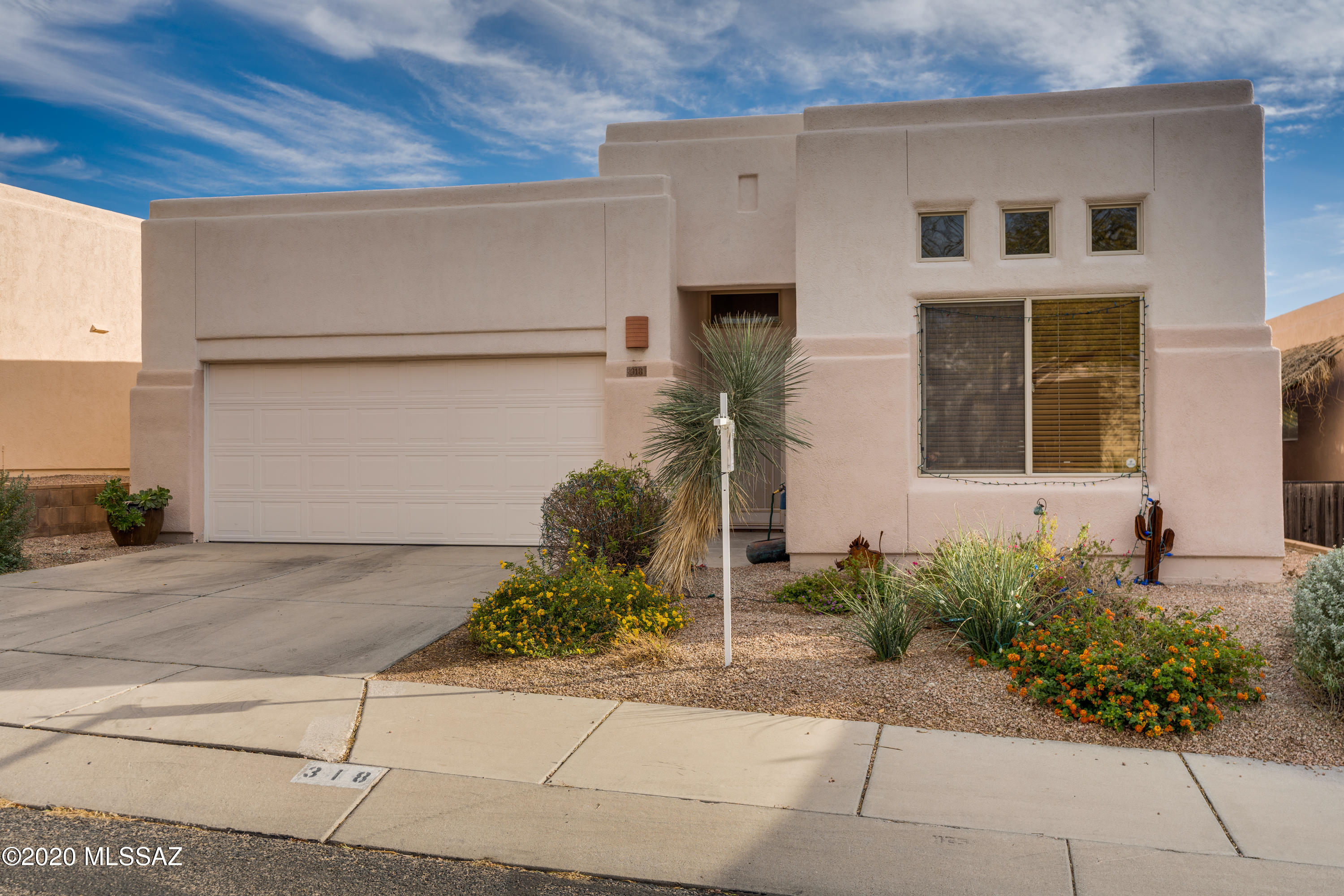 Absolutely immaculate home in the desired neighborhood of Rancho Lomas with sidewalks and community pool. Light & bright open floor plan features a den that can be a 3rd bedroom with closet addition. Owners suite includes double closets and dual vanities. Saltillo tile like ceramic flooring. Complete interior painting and garage epoxy floor (2015), Refrigerator, Microwave and Dishwasher have been upgraded, roof re-coated (2014). Two car garage with bonus work space. Private backyard backs up to the Geronimo wash with beautiful sunsets with inclosed patio. Close to Restaurants, Shopping and Schools. Antique Door on Den does NOT convey, door will be replaced. Ring Doorbell, Nest Thermostat, Water Softener, and Water Filtration System all convey.  Professional Photos Coming Soon.