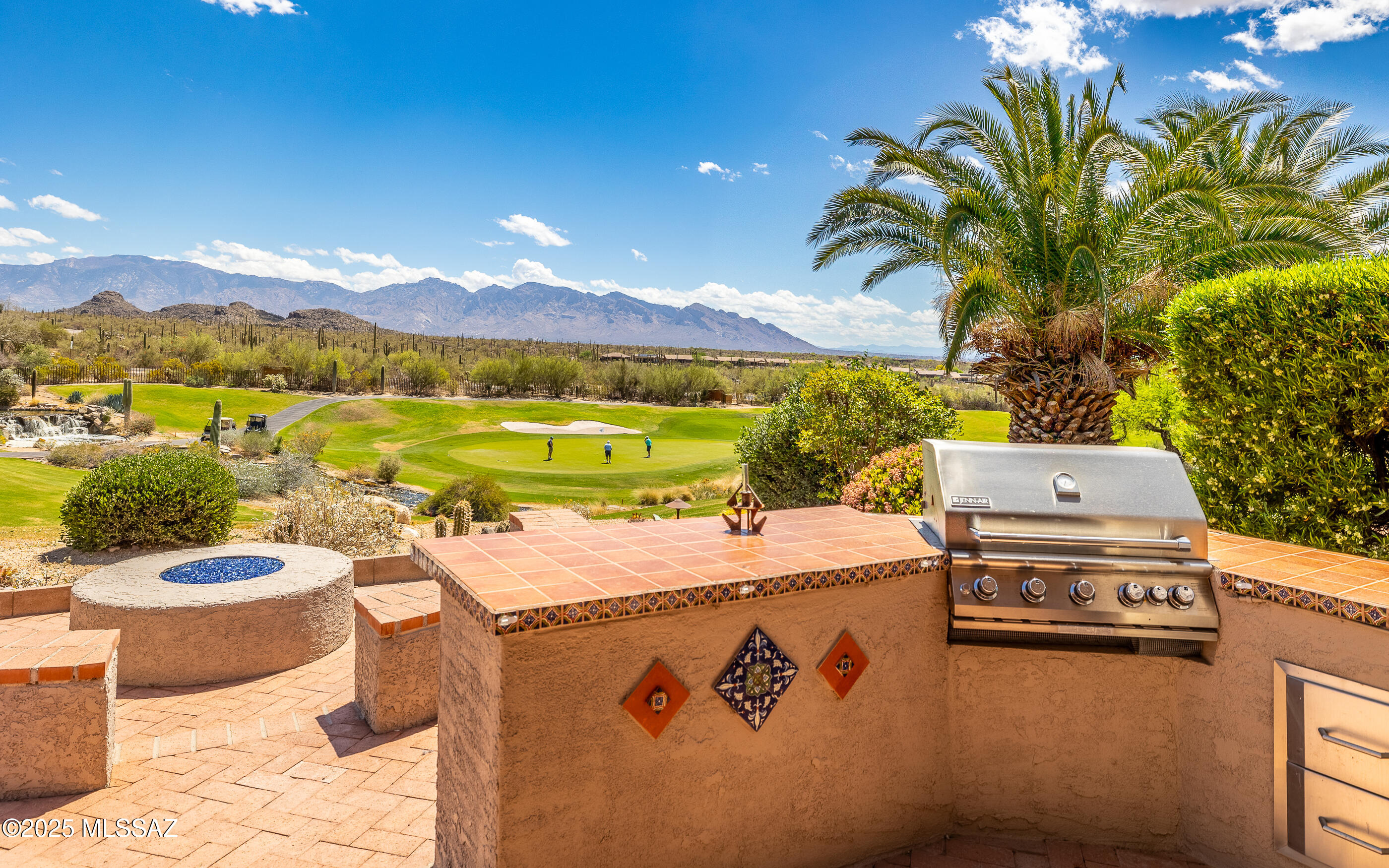Added 3rd golf cart garage makes this lovely Santa Barbara model boast perhaps one of the best values of The Highlands. Property looks over Highlands golf course lake ,endless golf course greens, Catalina & Tortolita Mountain ranges and will offer mesmerizing sunset views & city lights. Largest model in the subdivision - fabulous location - great layout w/3 bedrooms + den/craft/bonus room & extended laundry room. Many gorgeous upgrades and fine custom features.  Owned outright solar system, too. Lush grounds - large/wide side yard w/mature landscape. Private front courtyard. Expansive backyard resort sytle living w/fire pit, built in BBQ, raised beds and of course views! It's all about the views! Location, location, location! Call for private viewing.