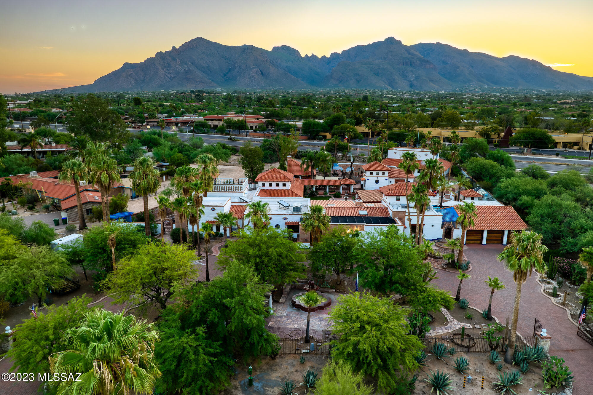 Discover a one-of-a-kind residence, nestled on a sprawling private compound, offering a haven of exclusive amenities, at a price point that would prove to be a formidable challenge to identify in the entire country. The privately gated estate, located in the renowned neighborhood of Casas Adobes, boasts meticulously crafted woodwork, a true testament to artisanal mastery. For the active enthusiasts, an array of facilities await: state-of-the-art indoor racquetball court + pickle ball conversion kit, basketball court, heated saltwater pool with aqueducts, indoor heated and jetted endless spool.

Property Detail Summary: