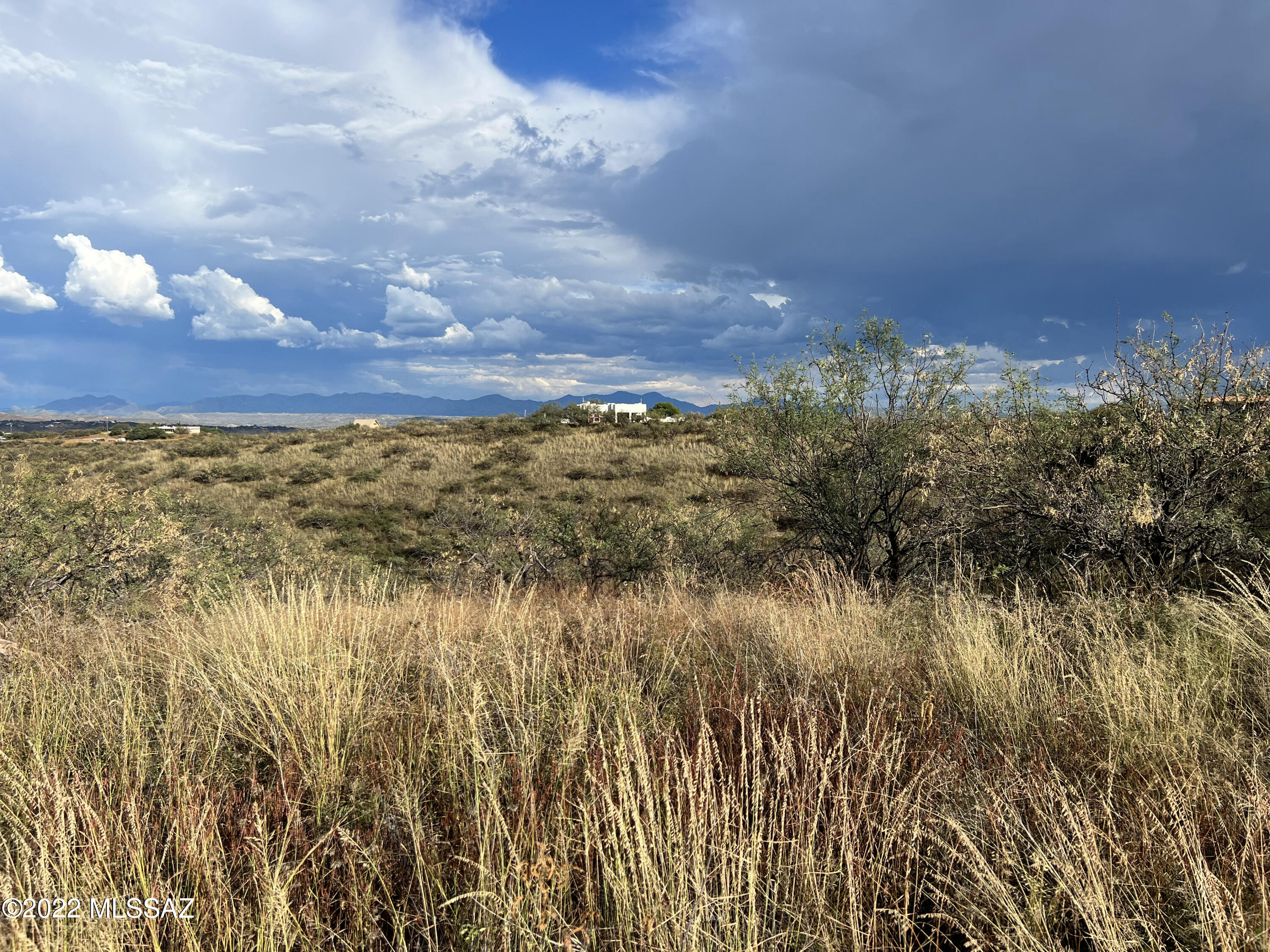 If you're looking for privacy but convenience to services, this 1.78 ac lot may be just what you need!  You can build now or later with the builder of your choice and the taxes will not increase until building is completed. Located less than an hour south of Tucson and only ten miles from the US border is the town of Rio Rico, or "Rich River." This community is nestled in the foothills of the Santa Rita Mountains and San Cayetano Mountains, near the Santa Cruz River. Here you'll find commercial and industrial centers along with a variety of residential options.

 

Recreation may include hiking in the Coronado National Forest, along the Juan Bautista de Anza National Historic Trail or participating in a birding tour to experience some of the area's rich biodiversity. Homes here are known for their large lots, offering plenty of space for outdoor living and enjoying the year-round mild weather.

 

Rio Rico pays homage to the area's rich past  ghost towns, missions, and ranches  while welcoming new neighbors. Rio Rico is the most affordable real estate market in Arizona serving as an ideal community for nearby Nogales. If you're looking for an affordable home in the area, you'll find some of the best starter properties in the many neighborhoods of Rio Rico. The communities in the area also serve as excellent housing for the many business and industrial centers.