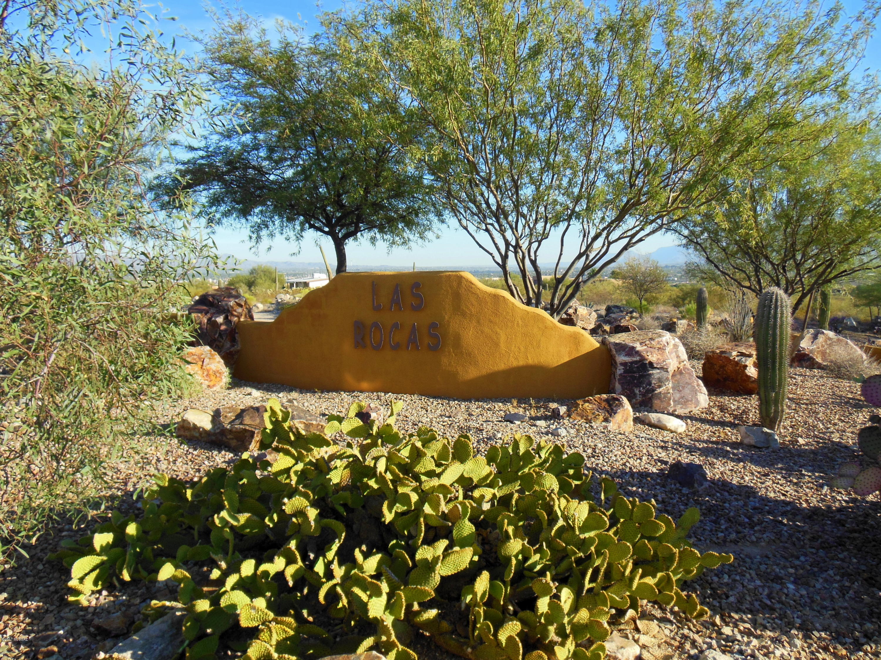 Absolutely beautiful gated community to build your dream house! Environmentally sensitive community with only 20 lots from  1.11 acres to 2.01 acres and 31.93 acres of common area so it seems like you have more land around you. Utilities are at the property lines and ready to hook up, you need to install your own septic. Great mountain and sparkling city lights. No Manufactured Homes allowed and all homes built shall be over 2500+ square feet. Easy access and minutes to I-10 - downtown and yet very quiet and tranquil area. Get ready to build and enjoy your home.