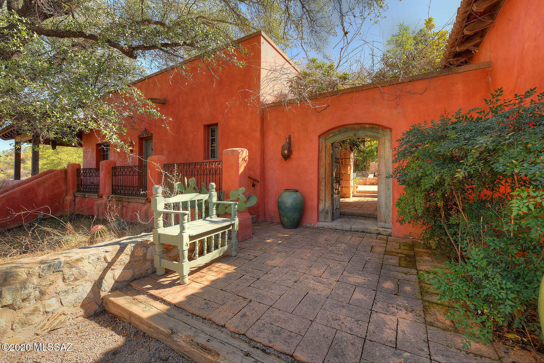 'Durazno'' an Arizona paradise near the mountains of Patagonia. Built in 2003, this combined 3 parcel 23 acre writer's retreat is just 10 minutes East of peaceful Patagonia near San Rafael Valley. ''Durazno'' named for it's rich peach colored walls, is a hacienda-style home comprised of a 2,829 sqft., 3 bedroom, 2.5 bath Main House, a 593 sqft Guest House and spacious European style stone barn w/ hay storage and tack room. There is a main courtyard and a heated exercise pool, a wooden ramada w/ flowering vines, fountains and trees. Wooden barn beams from Wisconsin were used in constructing the ceilings. Most doors and windows were imported from England and are aesthetically designed. There are Nepalese columns in the main hallway entry, 4 courtyards, 3 fireplaces. **PLEASE SEE SUPPLEMENT This beautiful custom built home is the creation of accomplished writer Laura Chester.  Ms. Chester worked with several architects and incorporated many of the ideas and treasures she and her beloved husband found throughout their travels to various parts of the world.

Ms. Chester has authored 24 books and was inspired to build "Durazno" after many years of visiting the area and while enjoying the pleasures of riding the back country.  Some of the ideas of her best writings were born here at her personal writer's retreat.  

This home is truly a masterpiece of the fusion of traditional hacienda and eclectic architecture and must be experienced to be fully appreciated.

Note: The chandelier in the living room shown in the photo has been replaced with an equally suitable chandelier obtained from a café from Paris, France.