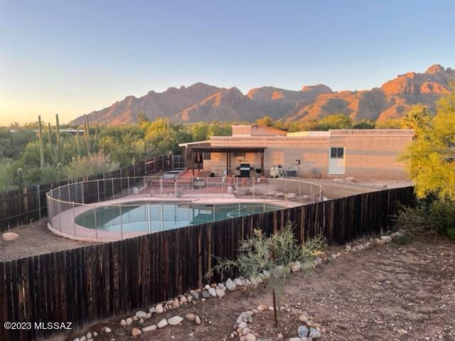 Opportunity for location, location, location! This home has expended its natural life & needs a complete re-do. Great lot with so much life yet to give! Price reflects the need for everything/damaged by roof leaks, some deferred maintenance, yet can be revived to offer itself once again as a stunning foothills home.  Come on over & bring your investors/flippers/builders. Owner has not lived in the property for many years so knowledge of condition is limited. See specific showing instructions & offer requirements-CASH only offers. Priced below market. Available to see 8-8 & 8-9 from noon-3:00pm. DO NOT DISTURB TENANTS!