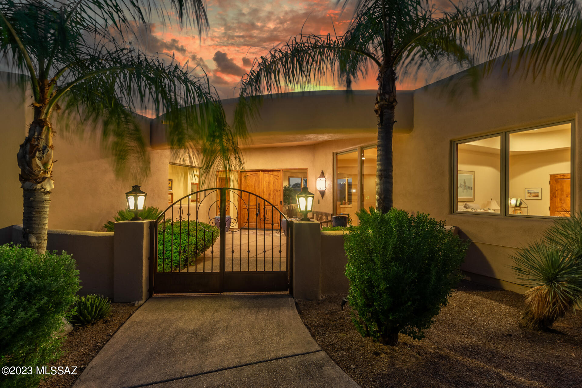 Gorgeous hidden mountain gem discreetly tucked away in the highly desired Catalina Foothills with breathtaking views. This 5 bed, 4 bath has a 3 car garage, and a gated entrance will greet you upon arrival. Inside you will find a spacious living area w/tray ceilings and recessed lighting, elegant tile flooring & soft carpet. The family room also boasts chic light fixtures and a 2nd fireplace. The formal dining room is perfect for hosting. The gorgeous kitchen is a chef's dream come true, featuring ample wood cabinetry w/crown molding, granite counters, and commercial-grade Viking stainless appliances. You'll love the opulent primary bedroom, which includes a lavish 5-piece bath w/an additional makeup vanity, a huge walk-in closet. The back yard has a pool/spa combo so this is a must see!