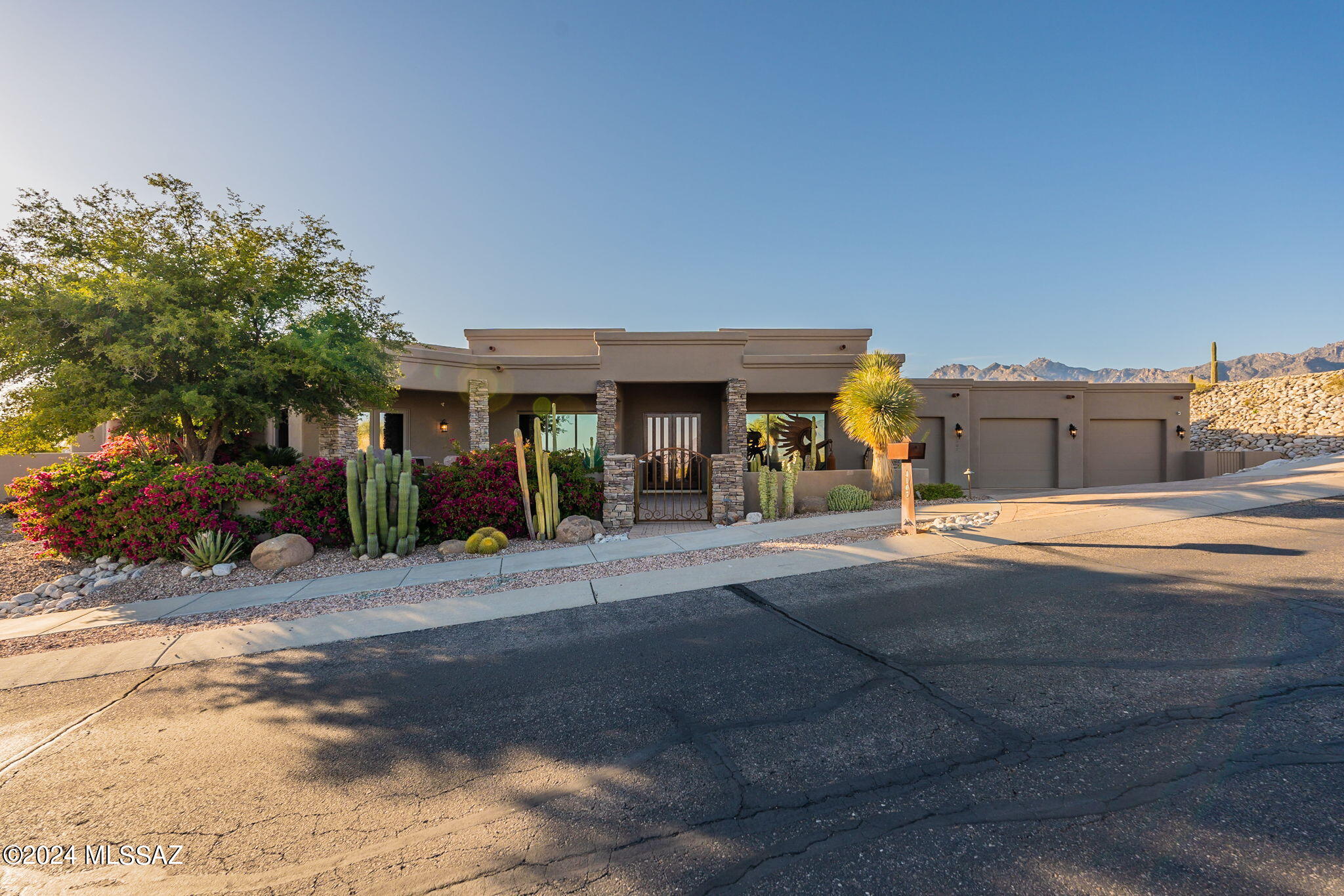 Exceptional 4BR & 4BA Single Story Custom Home Perched High Above Tucson in Gated Sabino Mountain w/ Panoramic City & Mountain Views! Fine Features Include: Brick Paver Courtyard Entry w/ Spectacular East Valley Views - Open Floor Plan w/Formal Living & Dining Spaces, Wet Bar, & Fully Retractable Glass Sliding Doors - Deluxe Island Kitchen w/New Granite, Stainless Sub Zero, Wolf, & Viking Appliances, Prep Sink + Wine Fridge, EZ Access to Outdoor Kitchen & Backyard - Spacious Primary Suite w/ Fireplace & Oversized Windows Framing the Views + Spa Like Bath - 2 En Suites + 4th BR/Office All w/Patio Access - Private Outdoor Living w/Covered Patio, Negative Edge Pool+Spa & Endless Views - 3 Bay Garage - Close to Sabino Canyon, World-Class Golf Resorts, Schools, Restaurants and Shopping.