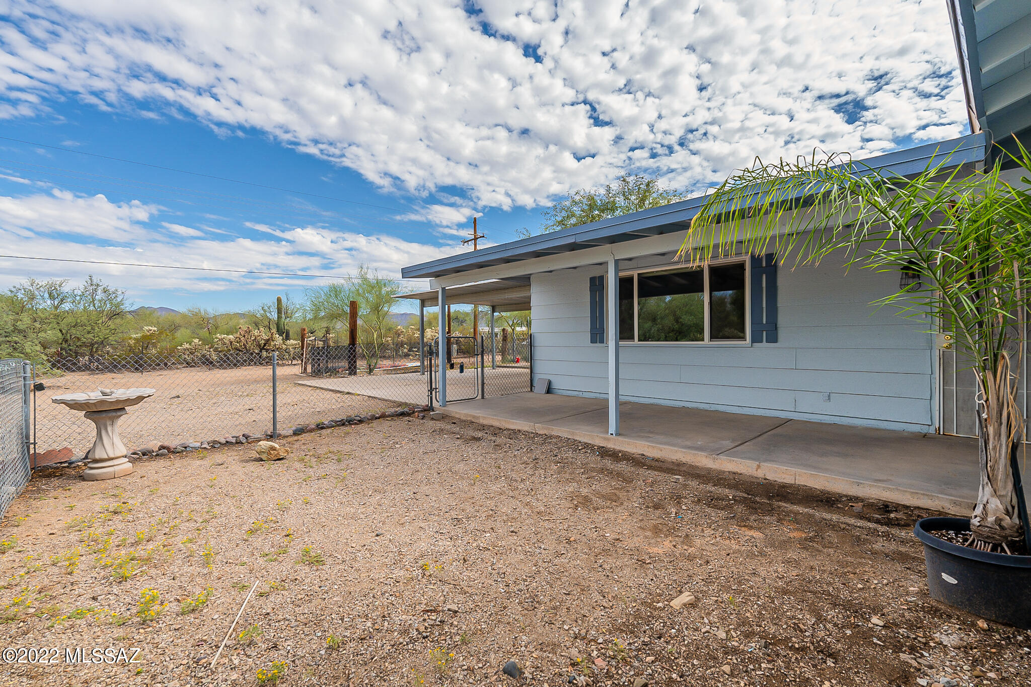 Lovely single level home on 2 acres. 4 bedrooms, 2 full bathrooms. Covered patio front and back, fenced dog run and private back yard area. New exterior paint, AC only a year old. Updated dual pane windows and newer roof.