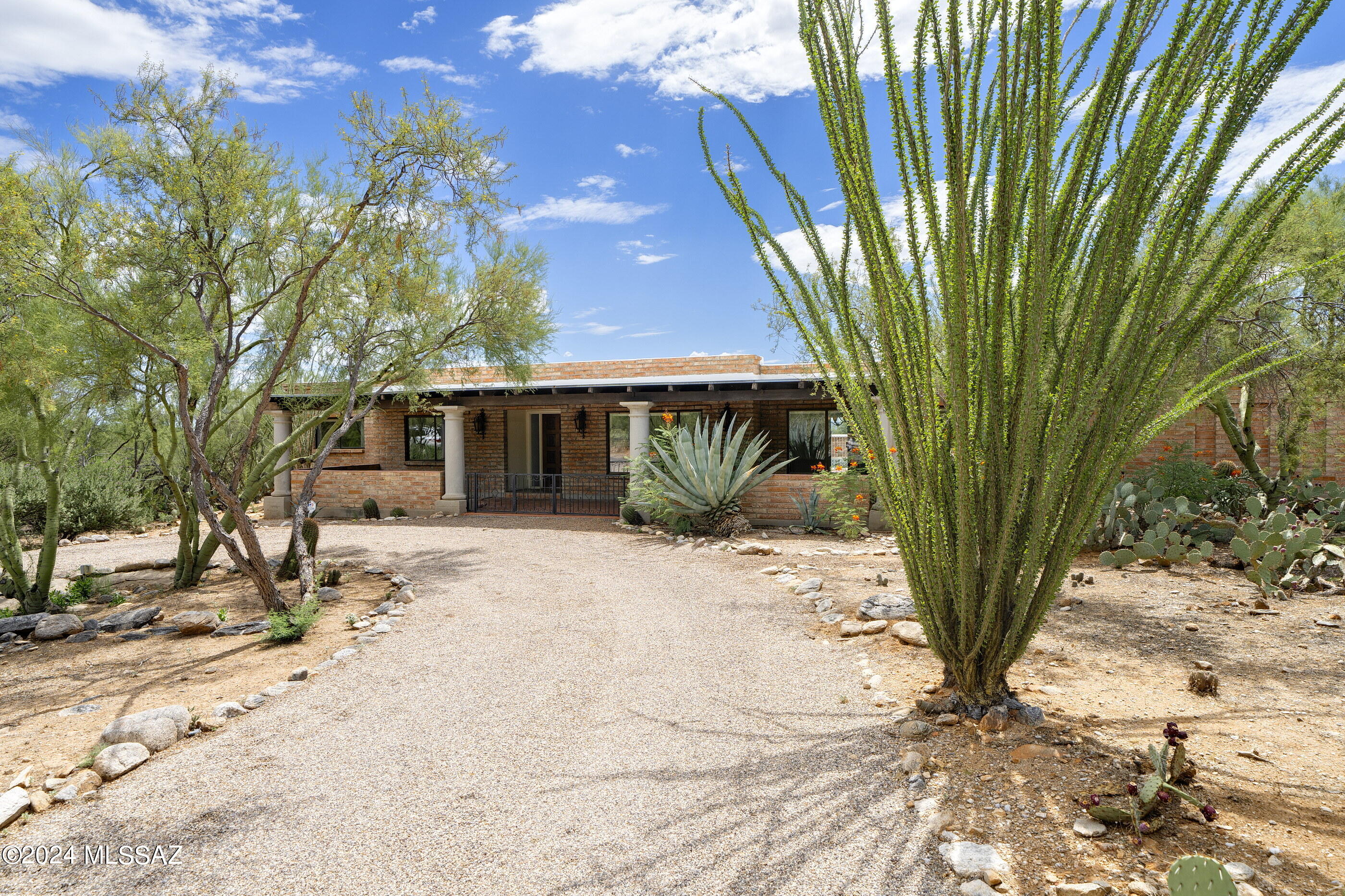 PRICE REDUCED! This corner lot in Catalina Foothills 8 is set on a .89 acre lot, offering mountain, sunrise and sunset views.  With 4 bedrooms, a spacious family room, formal living space, casual and formal dining and a large kitchen, the layout is perfect for entertaining or relaxing. The outdoor area is an entertainer's dream -  a sparkling pool, covered patio and gazebo.  District 16 schools, close to great shopping and restaurants too