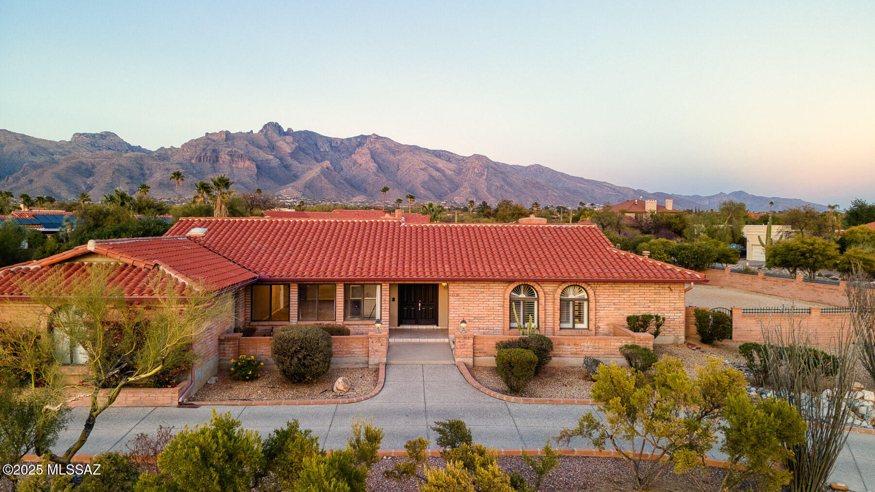 Welcome to 1151 E Rudasill Road, a stunning 4-bedroom, 3-bathroom Spanish Contemporary nestled on a corner lot in the highly desirable Shadow Hills neighborhood. This spacious residence offers the perfect blend of luxury, comfort. The oversized three-car garage, complete with epoxy flooring, EV power, provides plenty of space for vehicles and projects alike. Outside, the very large entertainer's yard is a true highlight, secure, pet-friendly, and perfect for hosting gatherings or simply unwinding while taking in the breathtaking Catalina Mountain views. Located within the esteemed District 16 schools, this home is just a short drive from the University of Arizona, Banner Medical Center, and the upscale shopping and dining of La Encantada. Combining an unbeatable location with exceptional features, it's more than a house, it's the perfect place to call home.