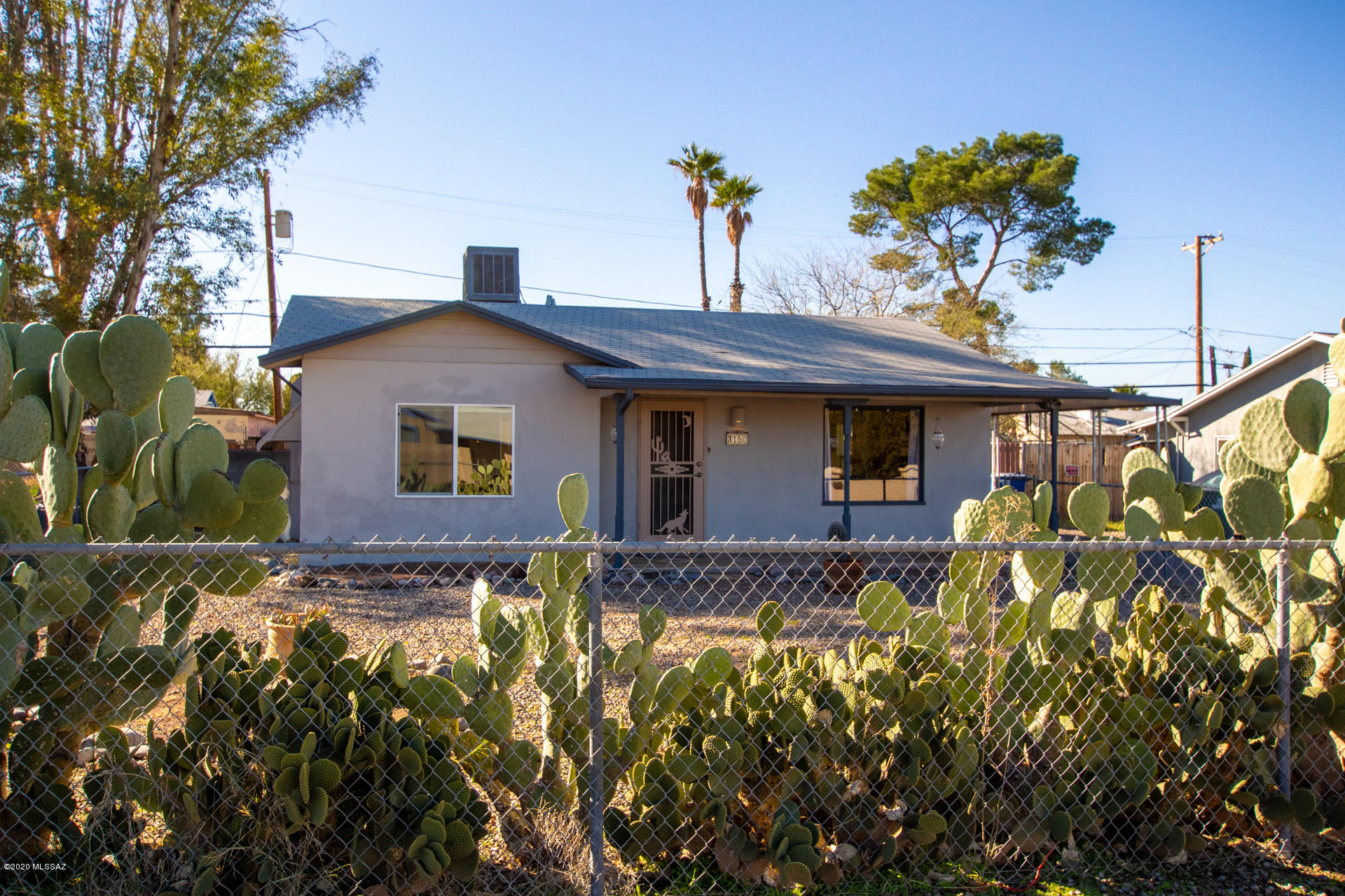 Charming Affordable 3#BR 2#BA HM Close to Downtown-Walk to Grocery Store & Reid Park! Feels Bigger than Square Feet. Great RM Floor Plan w/Picture Window & Built in Desk- Big Screen TV incl. Beautiful Fixtures, Molding, Baseboards & Niches throughout. Bright Kitchen w/Deep Sink & Stainless Steel Appliances incl: Gas Range, Microwave, Dishwasher & Refrigerator. Tile Throughout Except in Laundry RM-Washer & Dryer Incl. Updated Bathrooms. Spacious Guest RM's. Large Master w/Ensuite Bath, Big Walk-in Closet & Door to Back Yard. Fully Fenced Front & Back Yard w/Mature Landscaping. Entertaining Back Yard with Fire Pit, Flagstone Patio & Storage Shed. Most windows replaced. Newer Paint. Wrought Iron Security Screen Doors. Carport. Covered Front Porch.  Hurry Don't Wait till this Treasure is Gone!