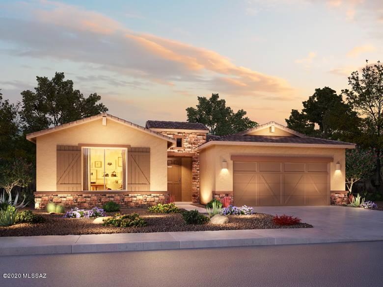 Brand new energy-efficient home ready June-July 2020! Beautiful Gourmet kitchen countertops, tiled backsplash, 42'' Upper linen white
cabinets, pendant lighting over island. Cabinets at owners entry and extended covered patio. Sip your morning coffee from the covered back patio. Inside, the kitchen island overlooks the great room and adjacent nook. The private owner's suite is tucked away from the secondary bedrooms and features dual sinks and large walk-in closet. Villages at Silverhawke is a premier location in Oro Valley that provides the feeling of an exclusive enclave. An expansive system of parks, trails and community amenities. Known for their energy-efficient features, our homes help you live a healthier and quieter lifestyle while saving thousands on energy bills.
