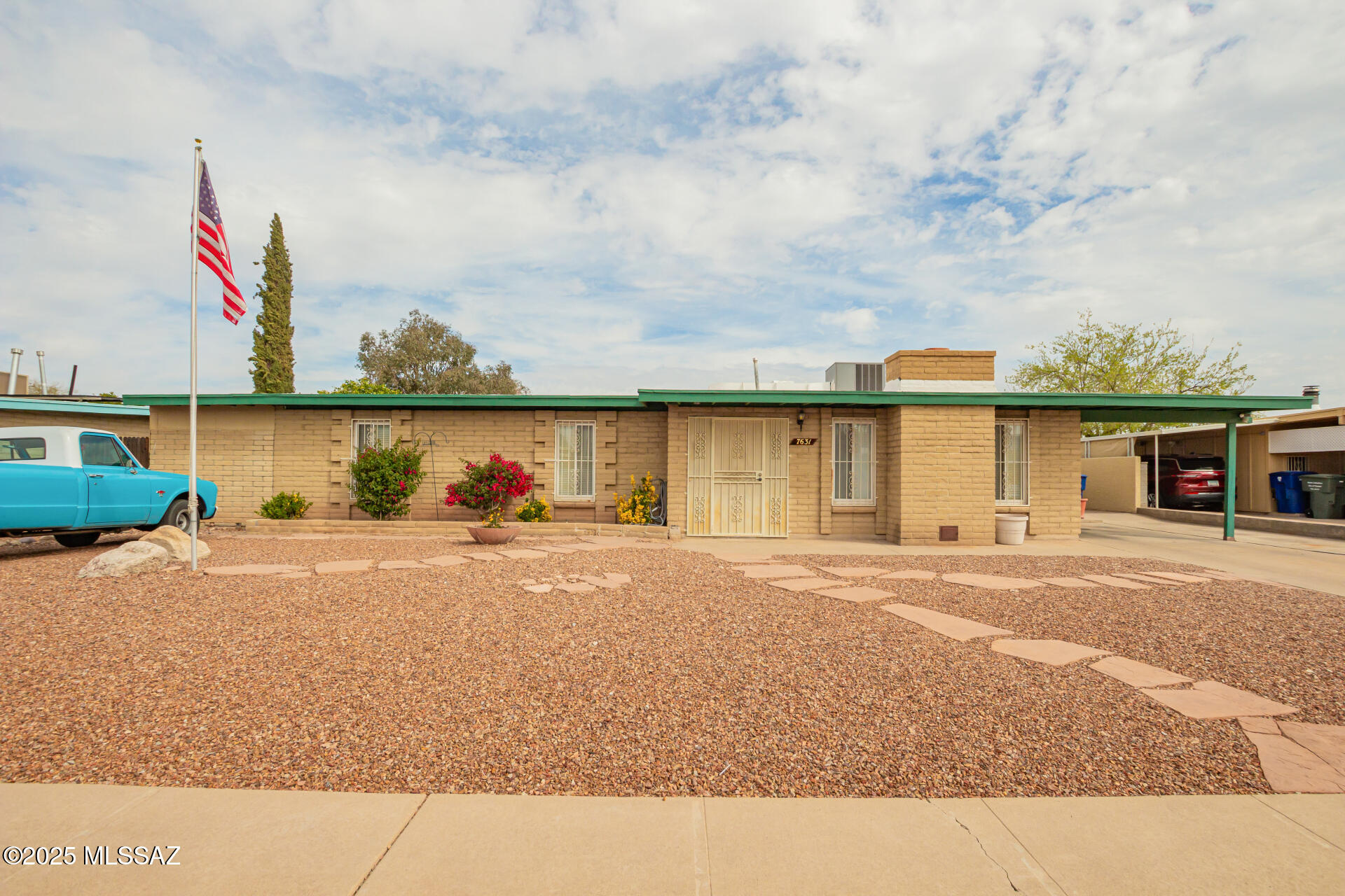 Beautifully maintained 1,940 sq ft, 3-bedroom home in East Tucson! Filled with natural light, this home features neutral paint, tile flooring, and wood-look floors in the bedrooms. The inviting living room boasts a cozy fireplace, while a large family room with French doors opens to your backyard paradise. The kitchen is equipped with built-in appliances, a tile backsplash, track lighting, and sleek cabinetry, plus a breakfast bar that flows into a charming dining area. Well-sized bedrooms  and A spacious bonus room offers endless possibilities—perfect for a home gym, game room, or hobby space. Plus, you'll love the convenience of a large laundry room and a workshop/storage room. he true highlight is the stunning entertainer's backyard! Enjoy a covered patio, lush green lawn, and a built-in BBQ with a stylish seating barideal for hosting gatherings. Cool off in the sparkling pool, soak in the relaxing spa, or simply unwind and take in the Arizona sunsets.

This home has it allschedule a showing today!
