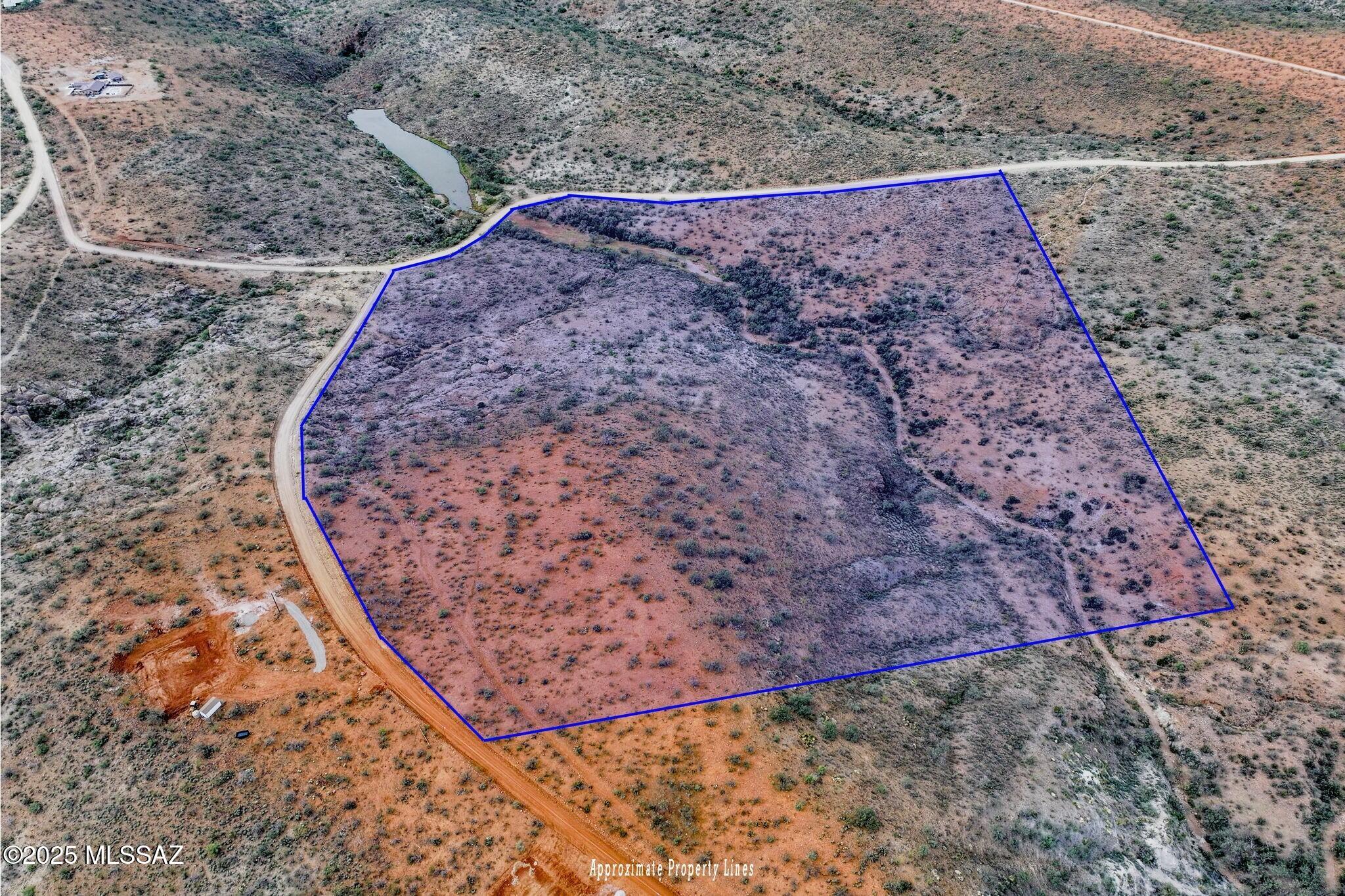Experience true desert serenity on this 40.02-acre lot in the desirable Tubac Foothills Ranch Subdivision. Located at TBD Camino Kennedy 96, this expansive parcel offers wide-open views, rolling terrain, and exceptional privacy—an ideal setting for a custom home, ranch, or retreat. Enjoy abundant native vegetation, unique rock formations, 360-degree panoramic views, breathtaking sunsets, and star-filled night skies all while being just minutes from Tubac's shops, dining, and galleries. A rare opportunity to create your own desert escape.