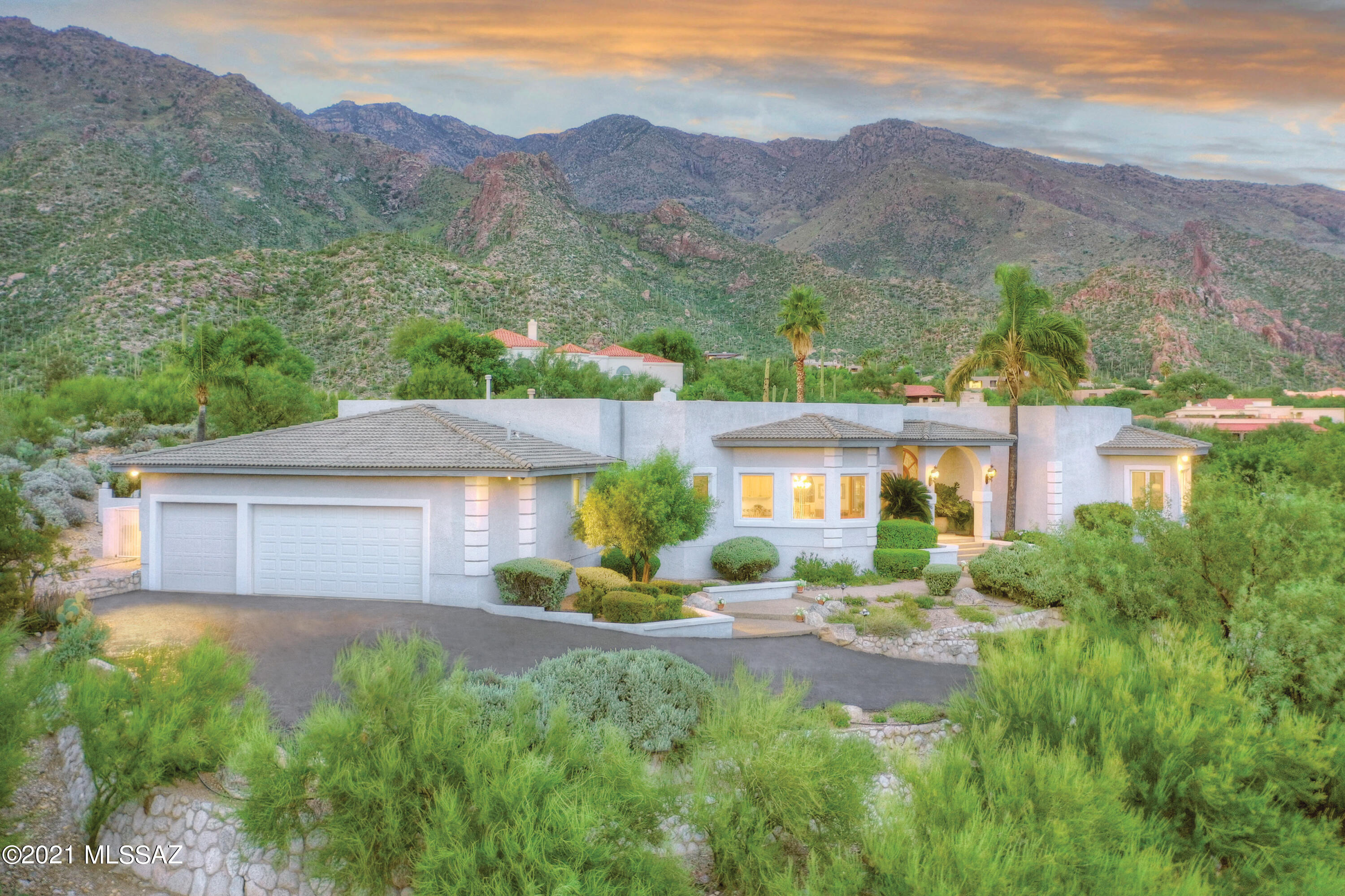 Stunning home on top of a ridge w/city & mountain views in prestigious Alta Vista. A foyer entry invites you into this exceptional home w/4355 sq.ft. Exquisite living room w/ high ceilings, Pella french doors, formal dining room, gourmet island kitchen w/granite countertops,dble ovens, side by side Subzero, prep sink, icemaker, wine cooler, lovely breakfast area, family room off kitchen w/fireplace,  gorgeous tile flrs throughout (no carpet), Pella windows, 4 BR's(split plan) + exec.study, 4 BA's, mstr w/sitting area, 2 walk in closets & lux.bath w/dble sinks, vanity, Jacuzzi tub, lg shower,  laundry rm,  3 car garage w/lg storage room & Dist.16 schools. Enjoy fabulous bkyd w/lg cov'd flagstone patio, BBQ,  pool, spa, lush landscaping, city, mountain, sunrise & sunset views.