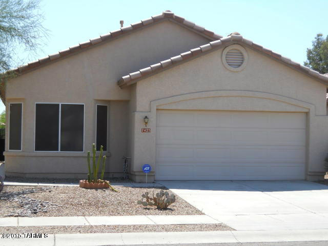 Charming home in a great location! You will love this 3 bedroom split plan, tile flooring, vaulted ceilings. Fantastic lot that backs to the wash mountain views of Sombrero Peak. Extended covered patio to enjoy the backyard. Community pool and spa and other amenities!!! Close to schools, shopping, restaurants and 1-10 for easy travel.