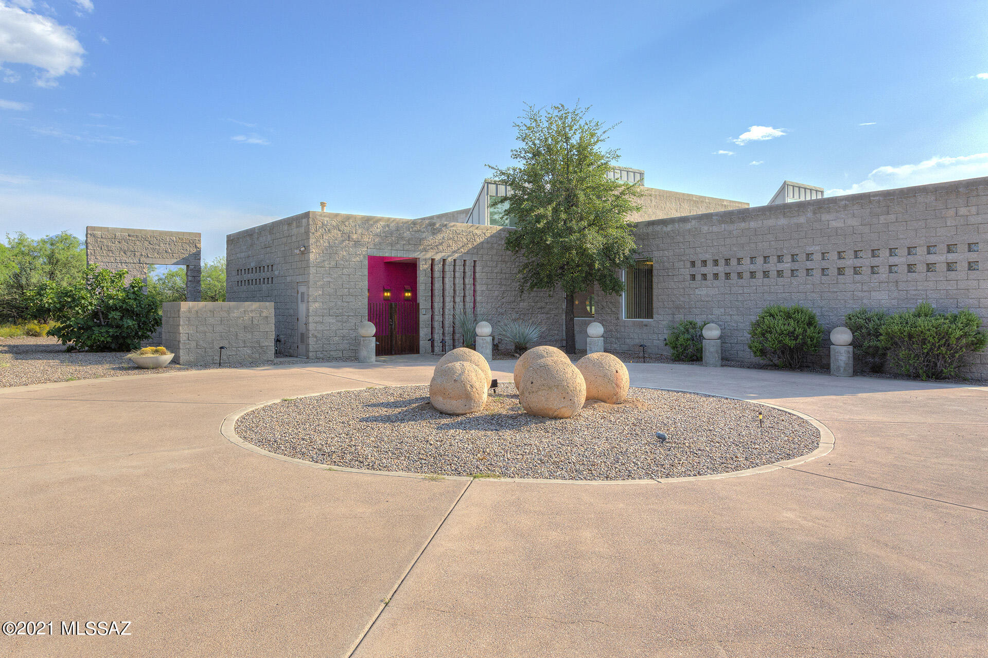 Floor to ceiling windows w/MT VIEWS! ONE OF A KIND!  Amazing home on just over 4 acres in  Pasadera.  3 Patios, lots of natural desert and a stunning circle driveway.  Inside you will find a VERY OPEN great room, dining area and kitchen.  The kitchen is large enough for a crowd of chiefs...Counter and storage space galore.Nearly floor to ceiling windows to the backyd from the great rm.The sideyd is off the kitchen & a perfect place to grill. All rms are a generous size.The first bedrm has separate his&hers closets and bathrms. The extra bedrooms-one set up as a studio w/wall beds, one set up as an office.  And both have their own bathrms.  There is a lovely entry way,open den for watching TV.  Yes you can bring everything you own because there are 2 huge storage rooms and a 3 car garage