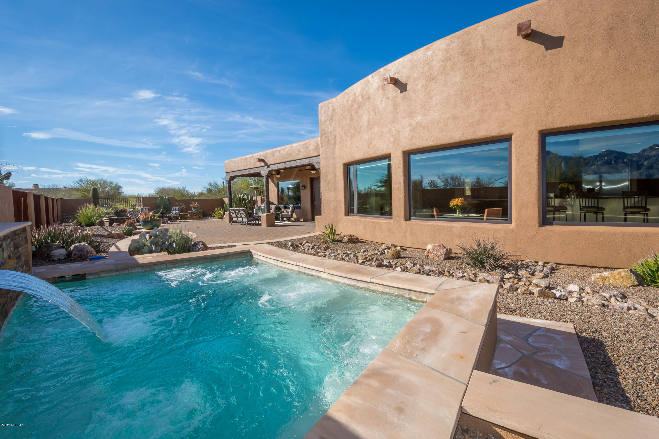 Welcome to The Estates at Honey Bee Ridge! This home checks all the boxes:  Beautiful Catalina and Tortolita Mountain views. Very private setting on a one-acre lot in Oro Valley's premier guard gated community. 3455 sq ft, 4 bedrooms, 3 bath, den, 3 car garage.  Open concept kitchen/great room.  Large master suite with sitting area.  Split bedroom floor plan. Two fireplaces.  Mountain views from every room. Fabulous outdoor living with heated spool, fire pit, and more mountain views!  Immaculate like new condition.  Easy to show.