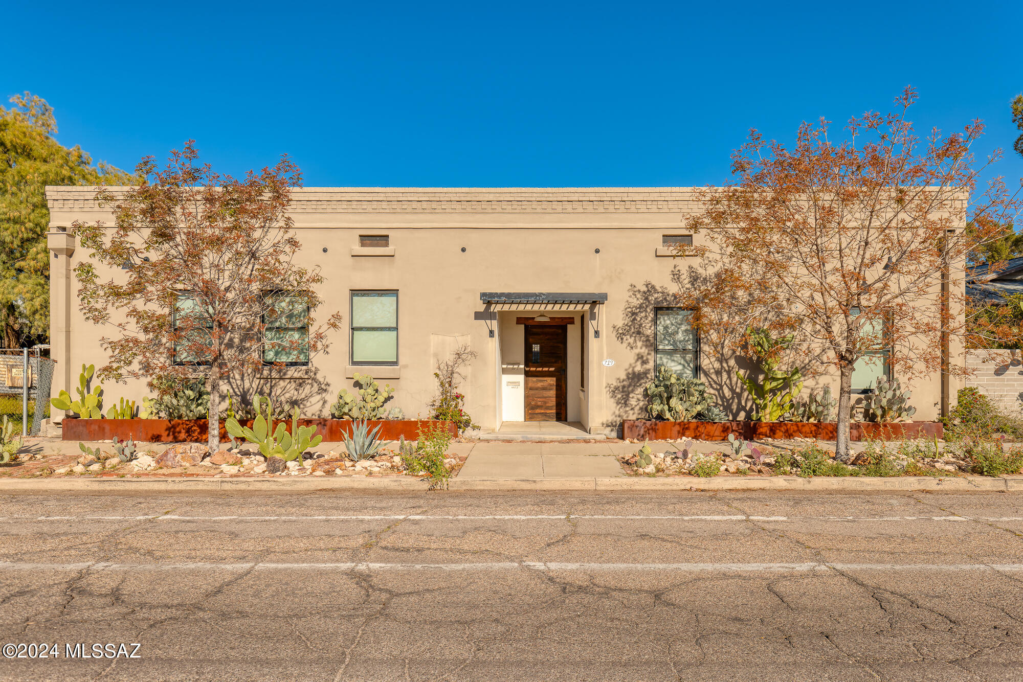 Once a bustling bakery, this iconic building has been meticulously transformed into a stunning 5,162 sqft residence, offering a harmonious blend of old-world charm and contemporary comfort. Spanning four units, boasting 5 bedrooms and 5 full baths, this expansive property offers a versatile environment suited for a variety of living arrangements. Whether you're seeking a live/work space, generational living quarters, communal areas for gathering, or a return to multiple apartments, this property offers endless possibilities.  Extensive renovations include updated electrical, plumbing, HVAC, and sewer systems, a comfortable and efficient living experience. The seller's vision for this space was one of adaptability and functionality, resulting in a seamless integration of historic elements with modern amenities. The central courtyard, flanked by two grand buildings, serves as the focal point of the property, evoking the charm of a bustling urban apartment with seamless indoor-outdoor transitionsa nod to the Central American living experience. Experience the allure of this historic gem, where the past meets the present in a harmonious union.