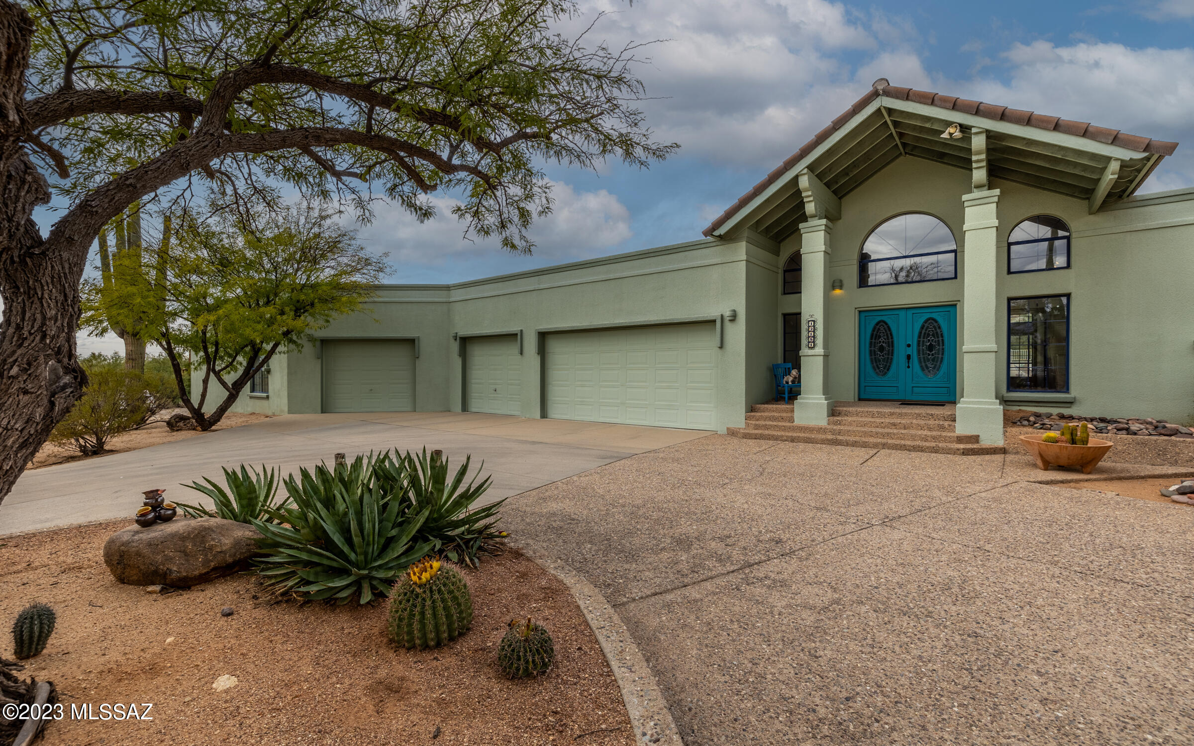 The perfect home for the car enthusiast!! Amazing masonry garage: The main garage is 32'8''x21'1'' with a ceiling height of 10'7'', the extended garage is 47'4''x35'0'' with ceiling heights of 11'3'' to 13'3''. Room for multiple cars plus RV. Enjoy the best of Tucson living on this 3.38 acre homesite with mountain views in every direction. Southwest Contemporary ambiance throughout! 3 romantic fireplaces for winter cheer and a sparkling pool for summer fun. Country style kitchen, grandly proportioned family room (18x26) complete with beams and a wet bar for entertaining. Two room owner's suite includes a library. Hobby room sized laundry. Check attached documents for idea on possible 4th Bedroom. Don't miss this Tanque Verde Gem!