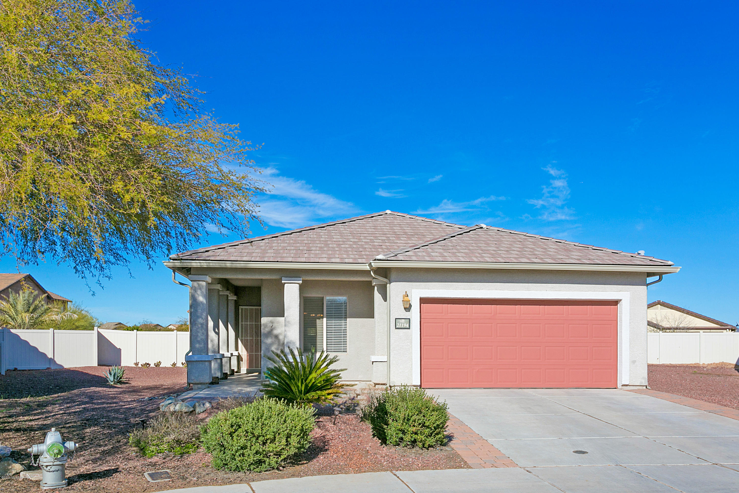 Spacious 4 bedroom, 2 bath home in impressive master community just north of Marana. Beautiful gray & white granite counters with custom tile backsplash and double ovens. Private Gazebos for entertaining in large backyard with fruit trees. Enjoy the benefits of your solar home with utilities at only $114 per month. Community offers lots of fun with water park, skate park, ball park, jogging trails basketball courts, play structures and Ramada's for large social gatherings.