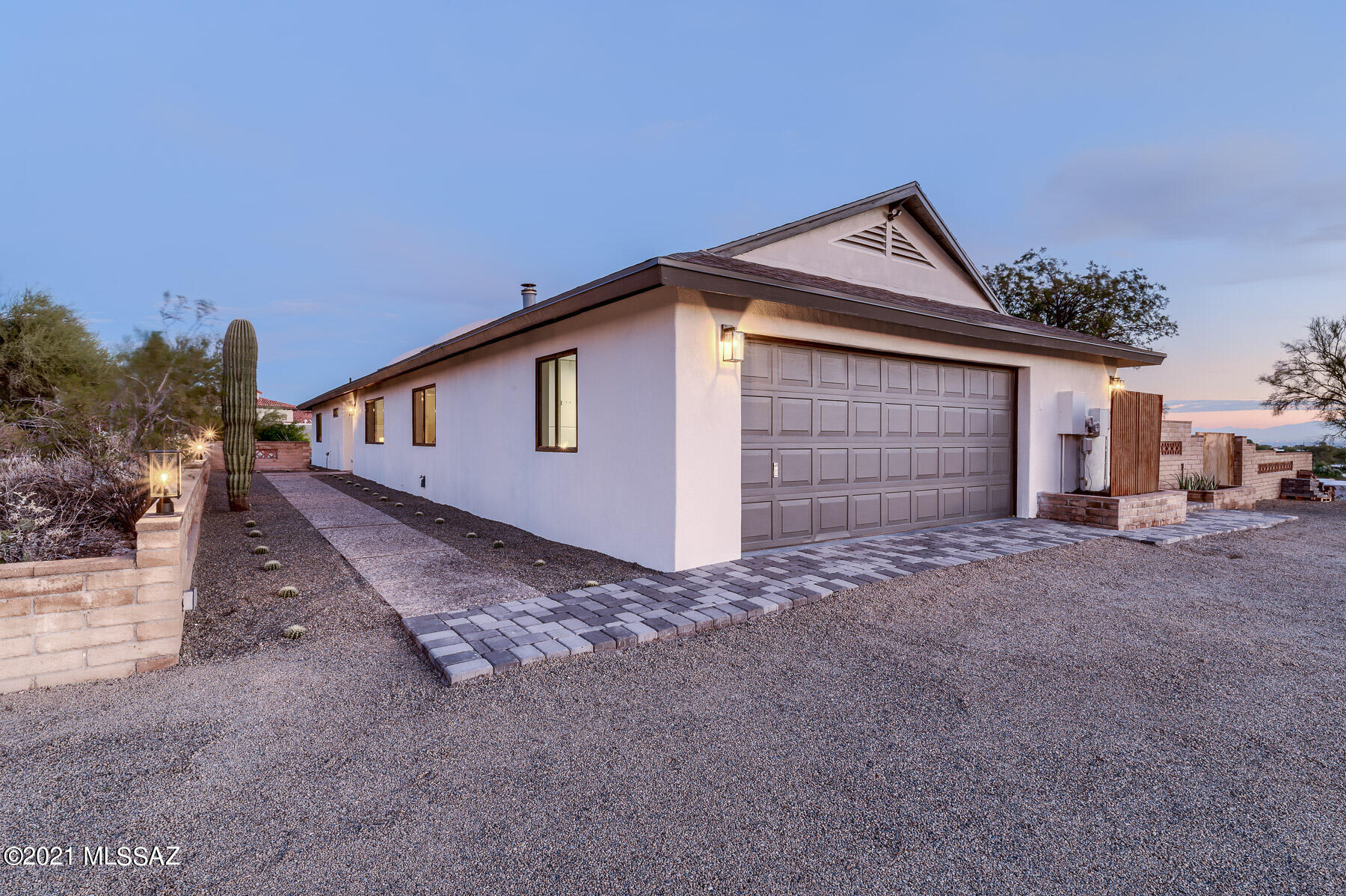 Stunningly remodeled home on an elevated lot to capture amazing city light, mountain and sunset views! Step inside this crisp and airy modern home with 48 inch wood-like tile throughout, fresh paint and double sided fireplace. In the kitchen you'll fall in love with the new cabinets and hardware with quartz countertops, new appliances and fixtures. Pass through window to patio dining area... Updated bathrooms also have new cabinets, stylish tile and fixtures. Bedrooms have new tile, paint and ceiling fans. Step outside on the extended porch with relaxing porch swing to enjoy the views! Landscaped yard with new pavers,turf and gravel and you can take a dip in the refreshing pool or in the spa!
Agent/Owner