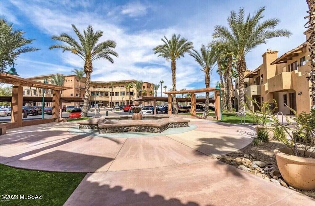 Stunning Penthouse overlooking UofA stadium and Catalina Mtns. This 2 bed with office & 2.5 baths is luxuriously special. Custom steam shower for a spa like experience. Many amenities include gourmet kitchen, featuring built in reprifgerator, stainless steel ovens, range hood & warming drawer, travertine floors, electric blinds, surround sound & display cabinet lighting.This floor zoned for residential or office use. Eterior/interior sq ft 2950. The outdoor patio is 145 sq ft with Napoleon grill, panoramic views and lots of space to entertain guests. Assigned parking spots 105 & 140
