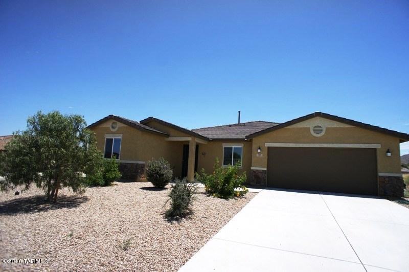Seller will accept or counter offers between $209,500. - $219,500. Priced to sell. All Offers Considered-Also consider lease purchase. Spacious & beautiful w/split floor plan! In Vail School district on corner lot. Large 5 bdrm/3 Full bath w/loads of storage. Open & airy kitchen, gas range, Island/Breakfast bar, granite counters & plenty of cabinet space. Dining area off spacious great room perfect for entertaining. Bonus room, Large master suite w/huge walk in closet and dual sink vanity. Tons of upgrades & extras throughout. Ceiling fans, Laundry room with W/D hook-up, 2 car garage, carpet/tile flooring. Low care backyard with covered patio! Enjoy the amazing mountain views from inside and out.