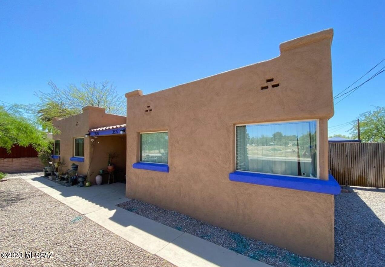 Centrally located income property convenient to schools, shopping and public transportation.  Large lot with central enclosed and gated common area for tenant use.  Includes two attached 2-bed/1 bath units with shared laundry room and one detached 1 bed/1 bath unit with enclosed rear yard. Storage shed on property.  Current rents add up to a total of $2,584 per month. DO NOT DISTURB TENANTS - must contact L/A 48 hours prior notice. Listing agent is related to Sellers.