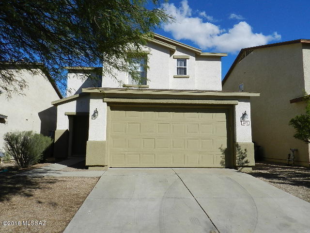 Seller will accept or counter offers between $176,000-$181,000. Fabulous 3 bedroom 2.5 bath home in Palo Verde High School District. Recently renovated, all New interior paint, New carpet, New ceiling fans, New kitchen faucet and New tile in main wet areas on lower level. This 2-story home also offers an amazingly spacious great room, covered patio and huge balcony off Master Bedroom.  Views of the Catalina and Rincon Mountains.