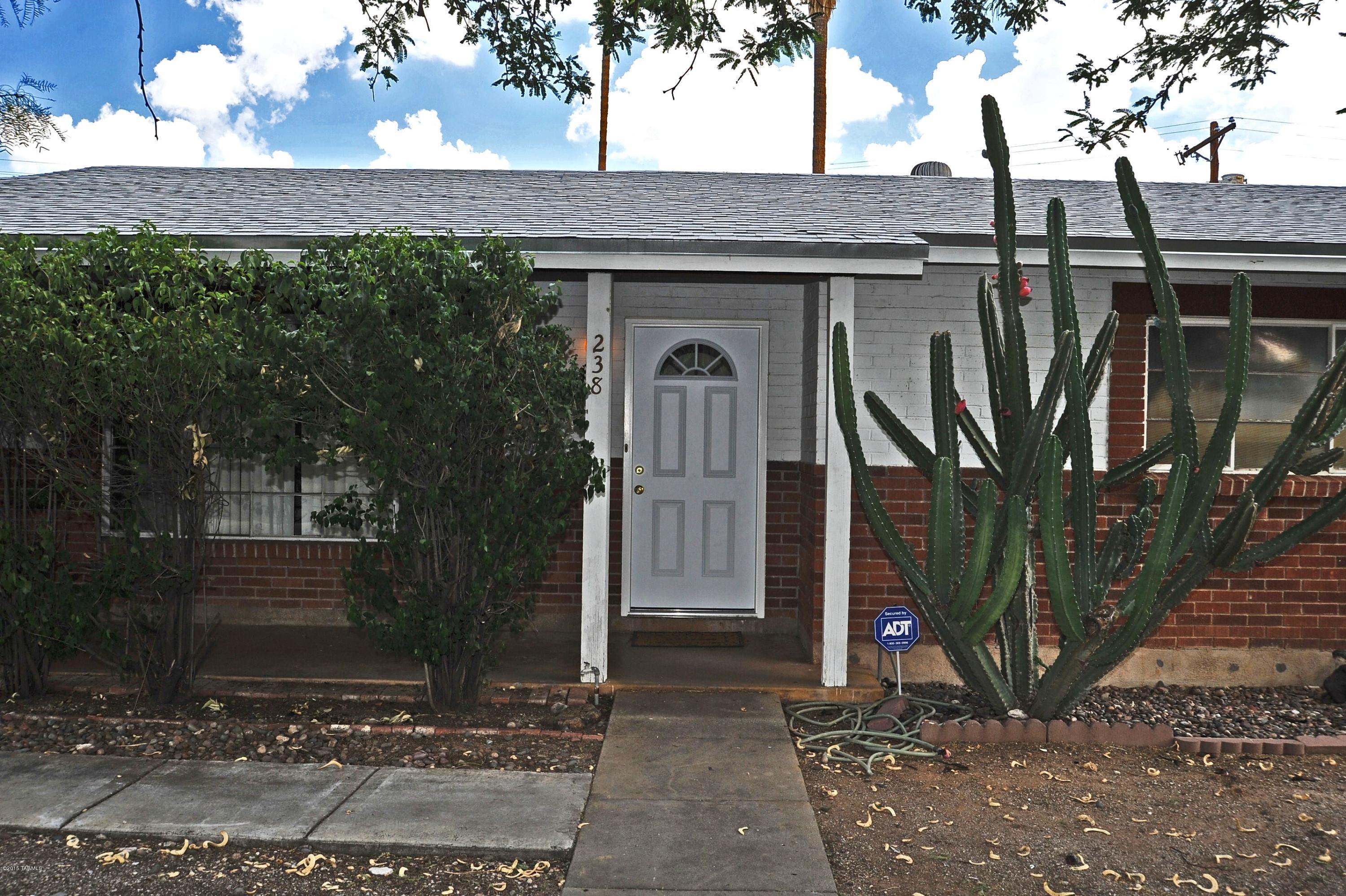 Spacious 3 Bedroom 2 Bath Home in the Heart of Tucson- Sam Hughes Neighborhood.  Classic Brick Home with 2 Living Areas, Storage, plus Workshop & Spacious Lot. New Roof in 2014 & New Paint, guest Bathtub Newly Refinished.  Private Backyard with Covered Patio.  1 Car Garage & Carport plus Additional Parking in Driveway. Seller will consider all offers.  This is a must see!!
